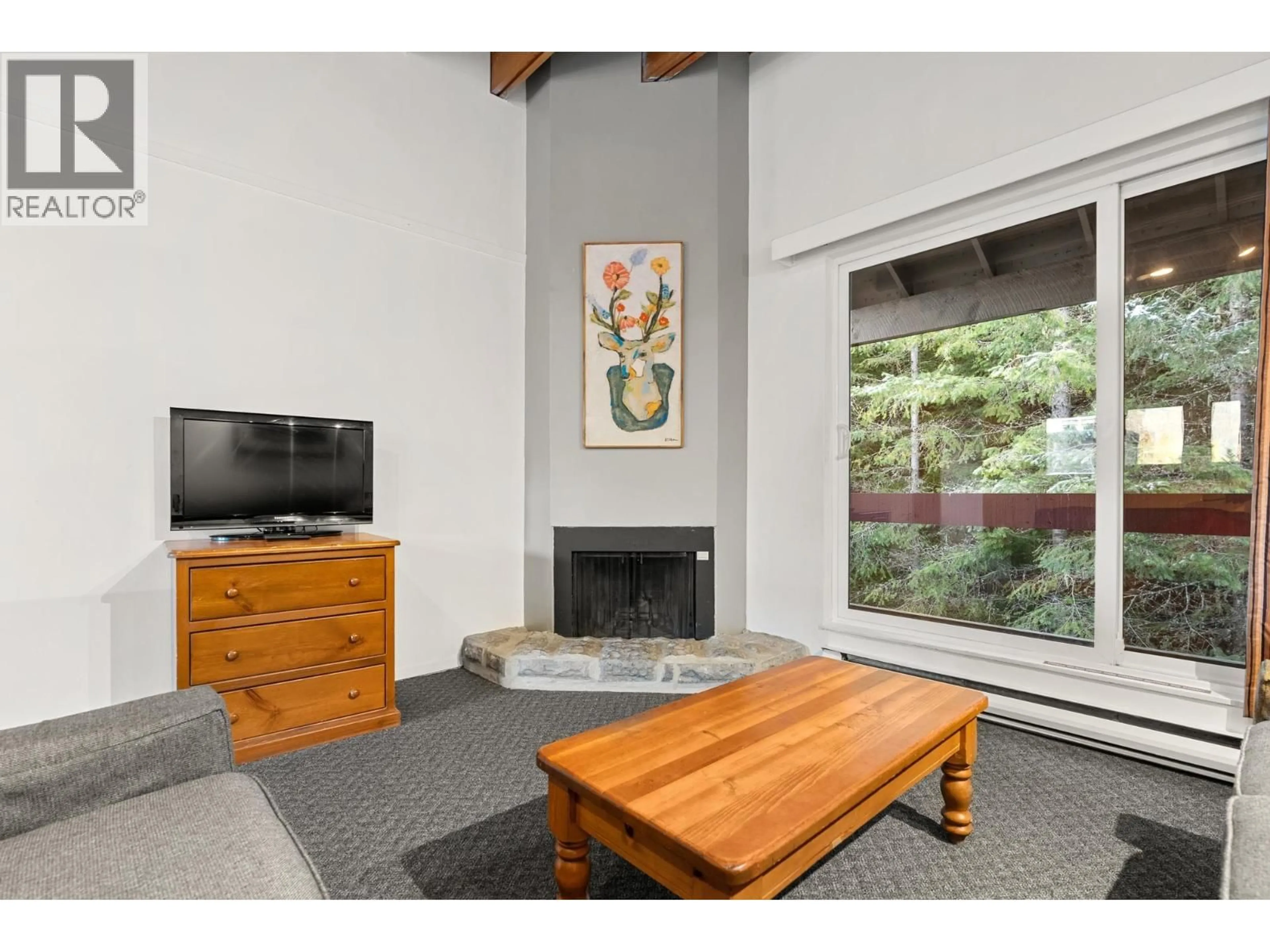 Living room with furniture, unknown for 513 - 4200 WHISTLER WAY, Whistler British Columbia V8E1J4