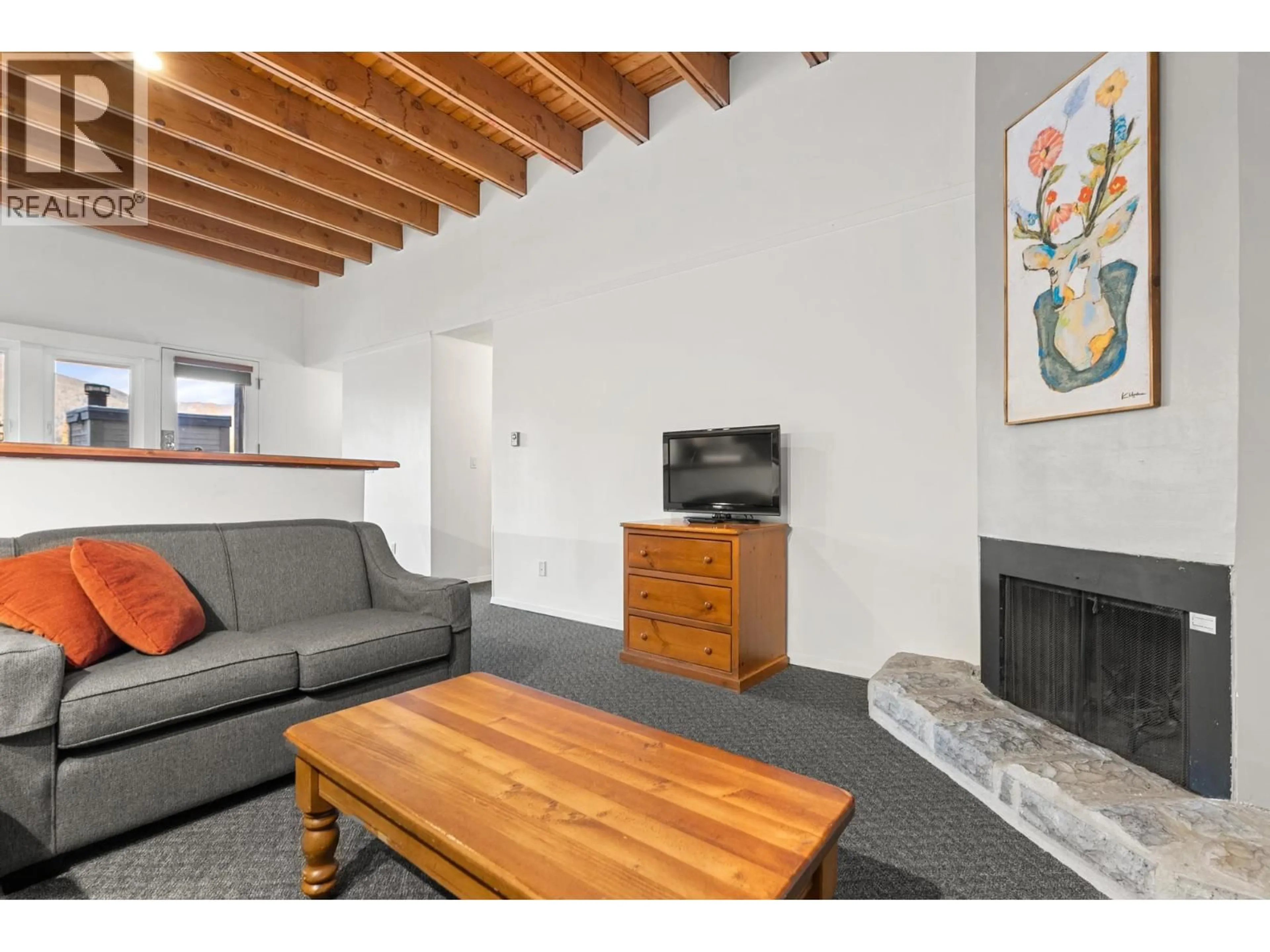 Living room with furniture, unknown for 513 - 4200 WHISTLER WAY, Whistler British Columbia V8E1J4