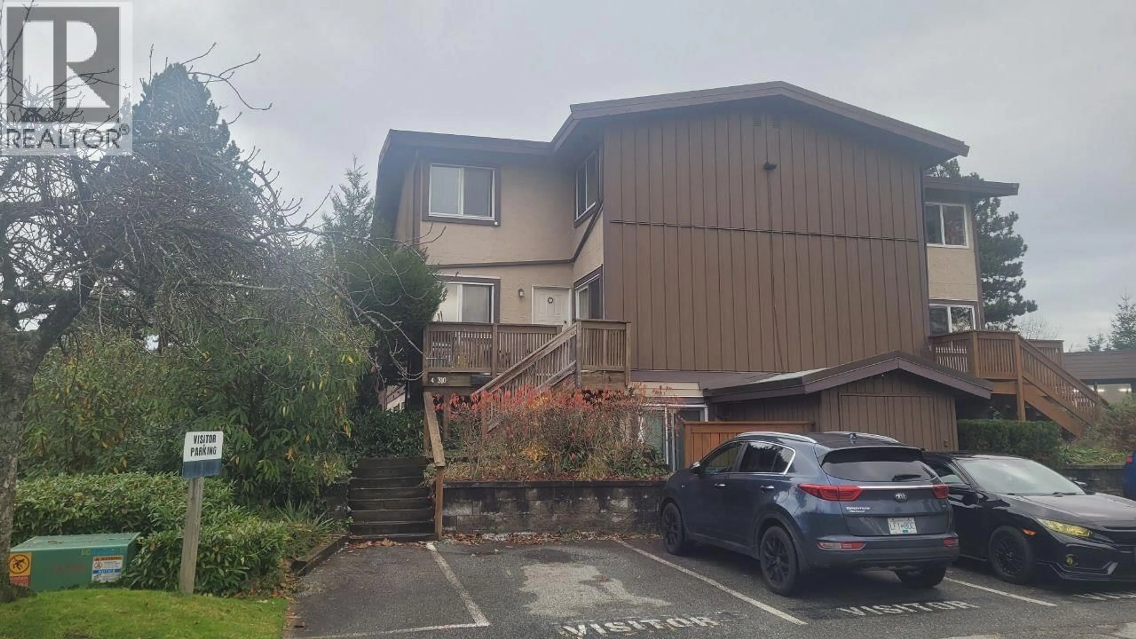 A pic from outside/outdoor area/front of a property/back of a property/a pic from drone, street for 4 - 310 HIGHLAND WAY, Port Moody British Columbia V3H3V7