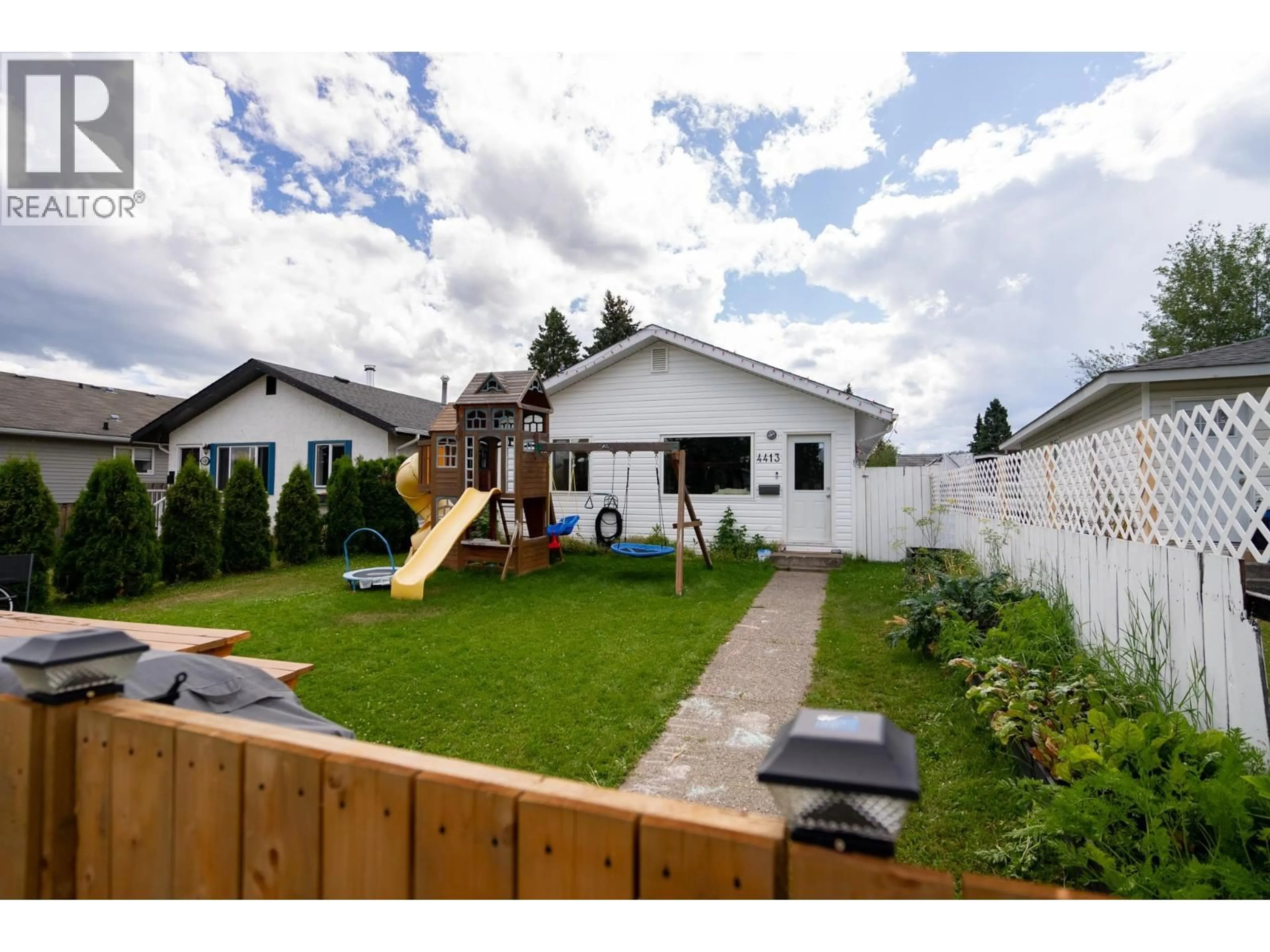 A pic from outside/outdoor area/front of a property/back of a property/a pic from drone, street for 4413 1ST AVENUE, Prince George British Columbia V2M1C7