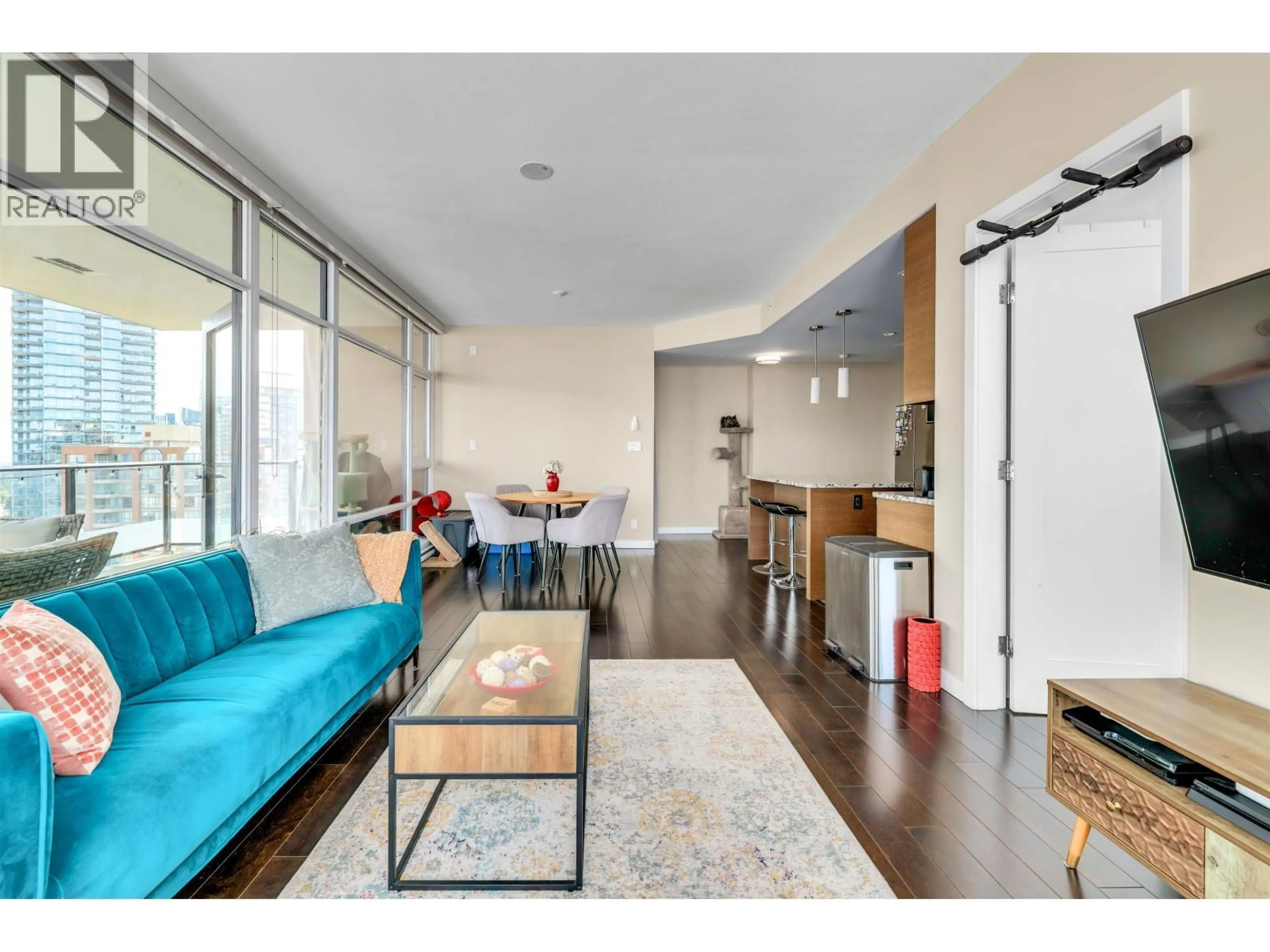 Living room with furniture, wood/laminate floor for 1801 - 6168 WILSON AVENUE, Burnaby British Columbia V5H0B2