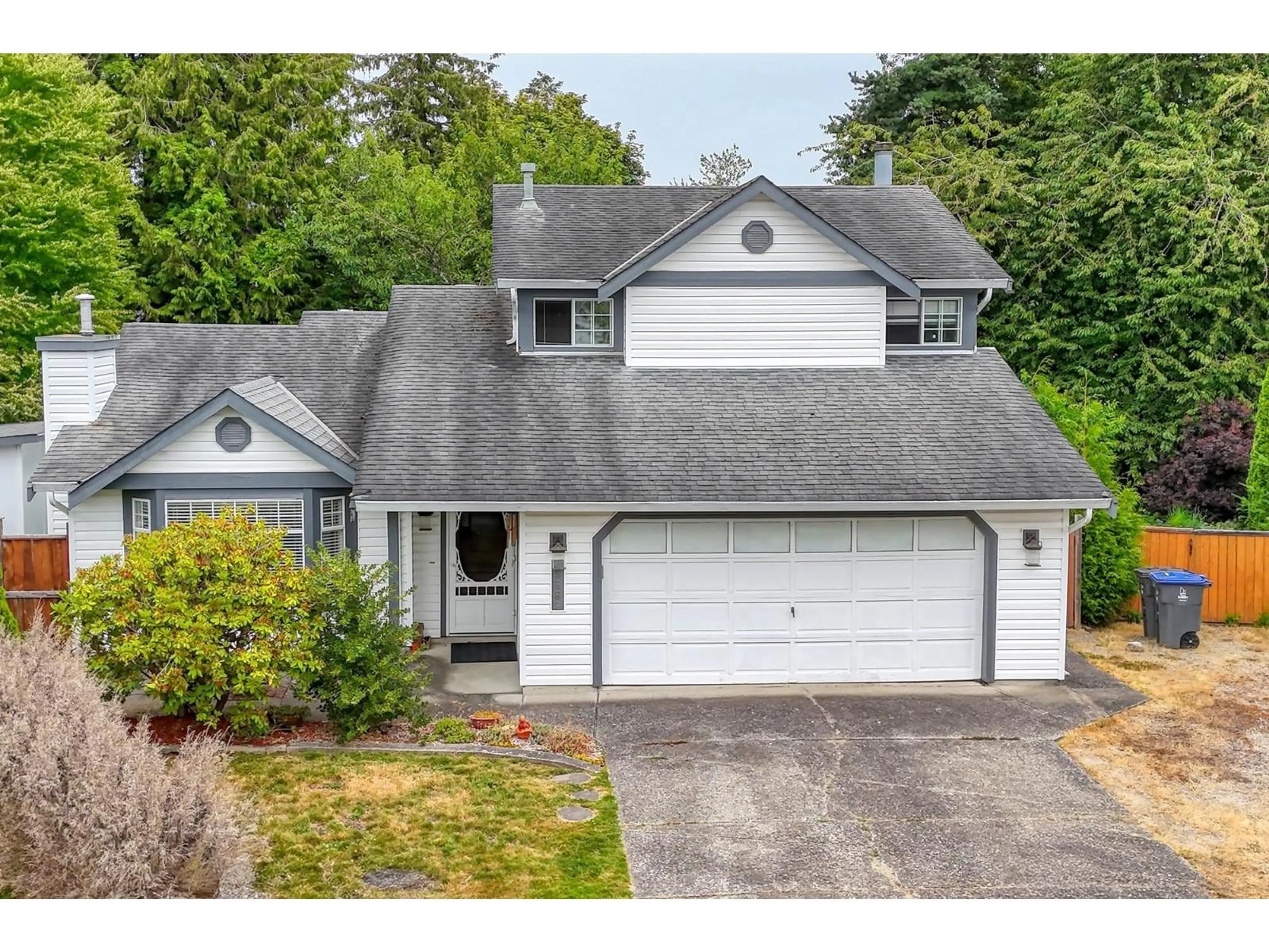 Home with vinyl exterior material, street for 5882 169A, Surrey British Columbia V3S6Z8