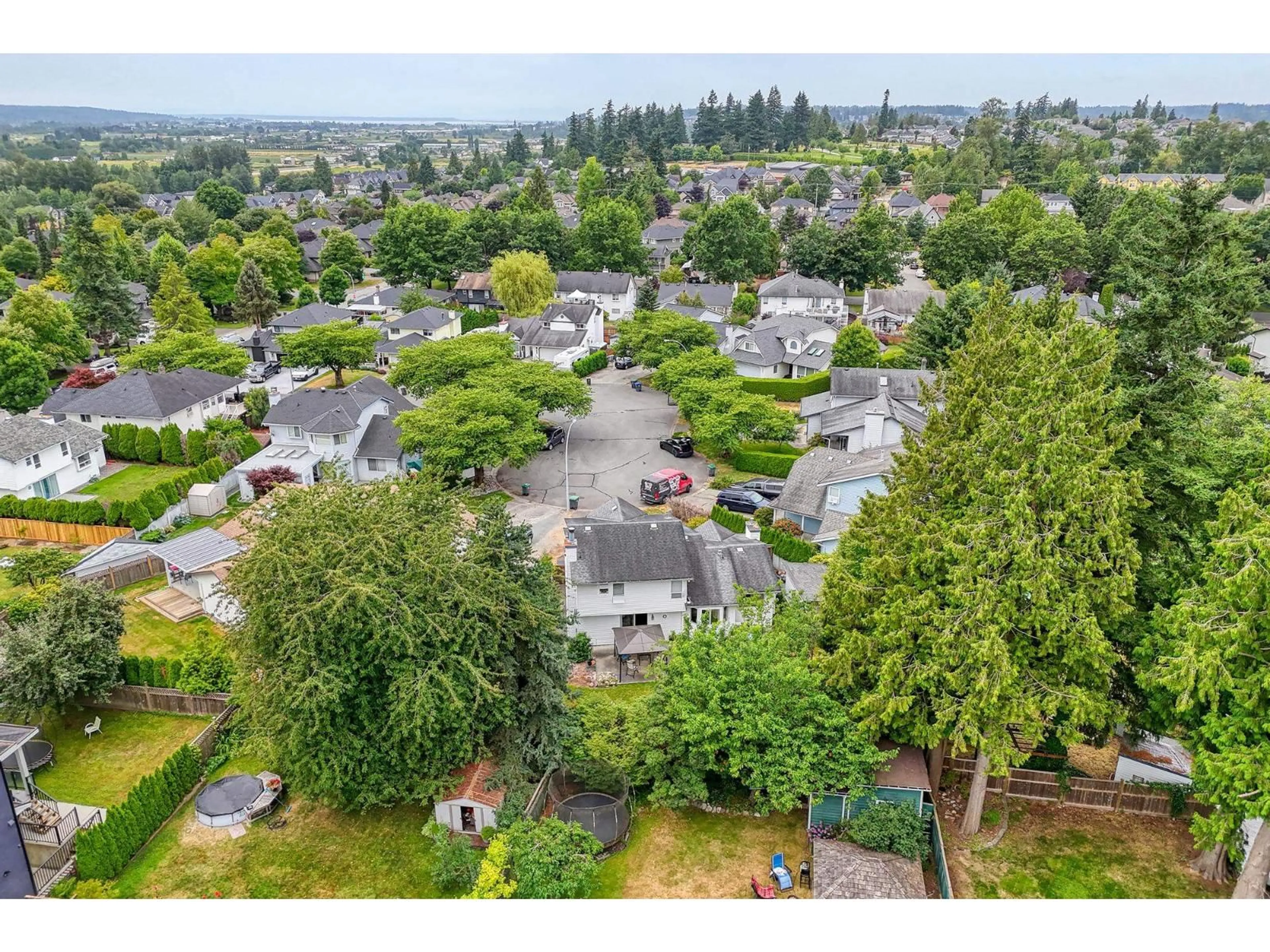 A pic from outside/outdoor area/front of a property/back of a property/a pic from drone, water/lake/river/ocean view for 5882 169A, Surrey British Columbia V3S6Z8