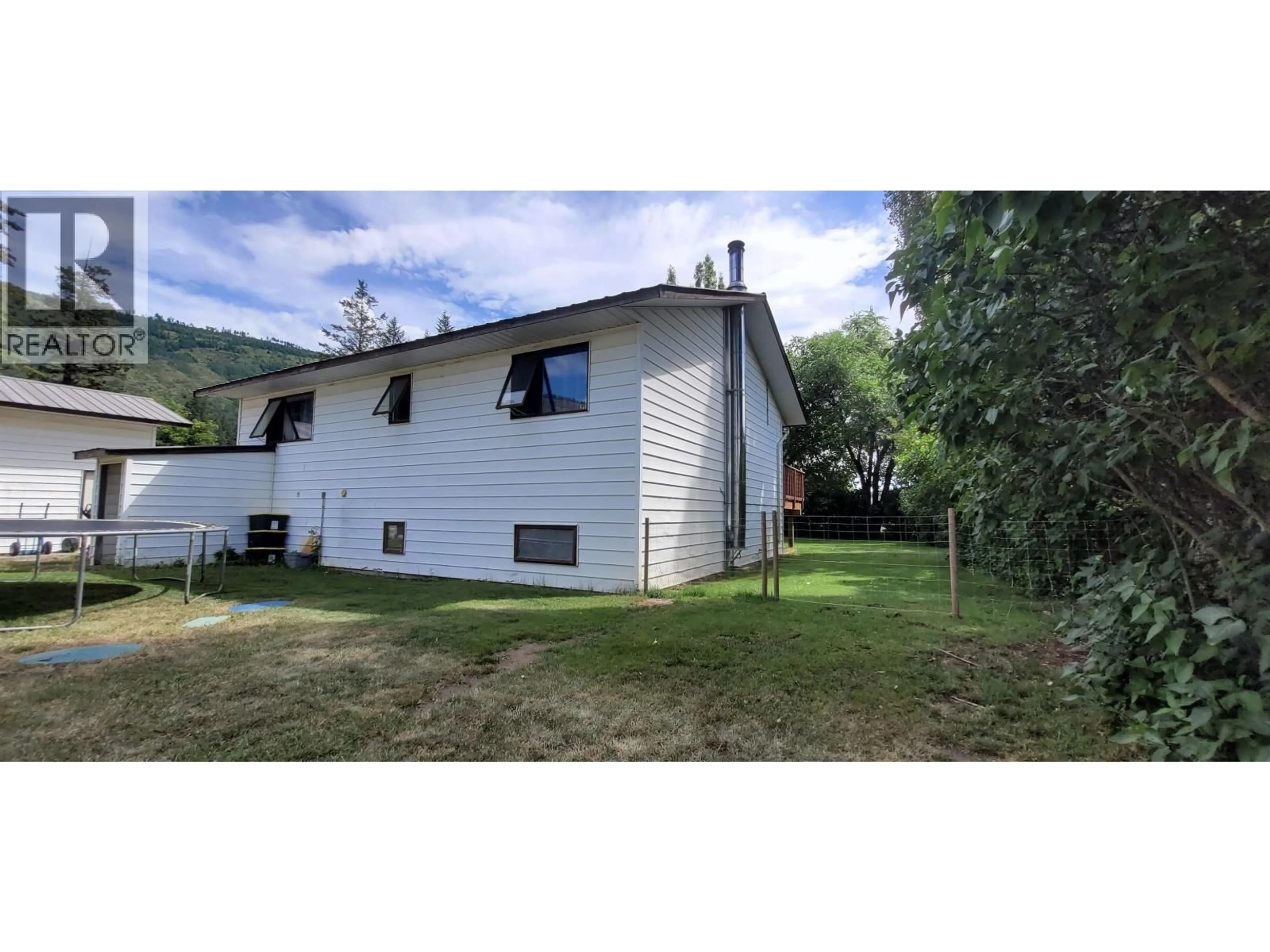 A pic from outside/outdoor area/front of a property/back of a property/a pic from drone, mountain view for 8376 SPUR ROAD, McLeese Lake British Columbia V0L1P0