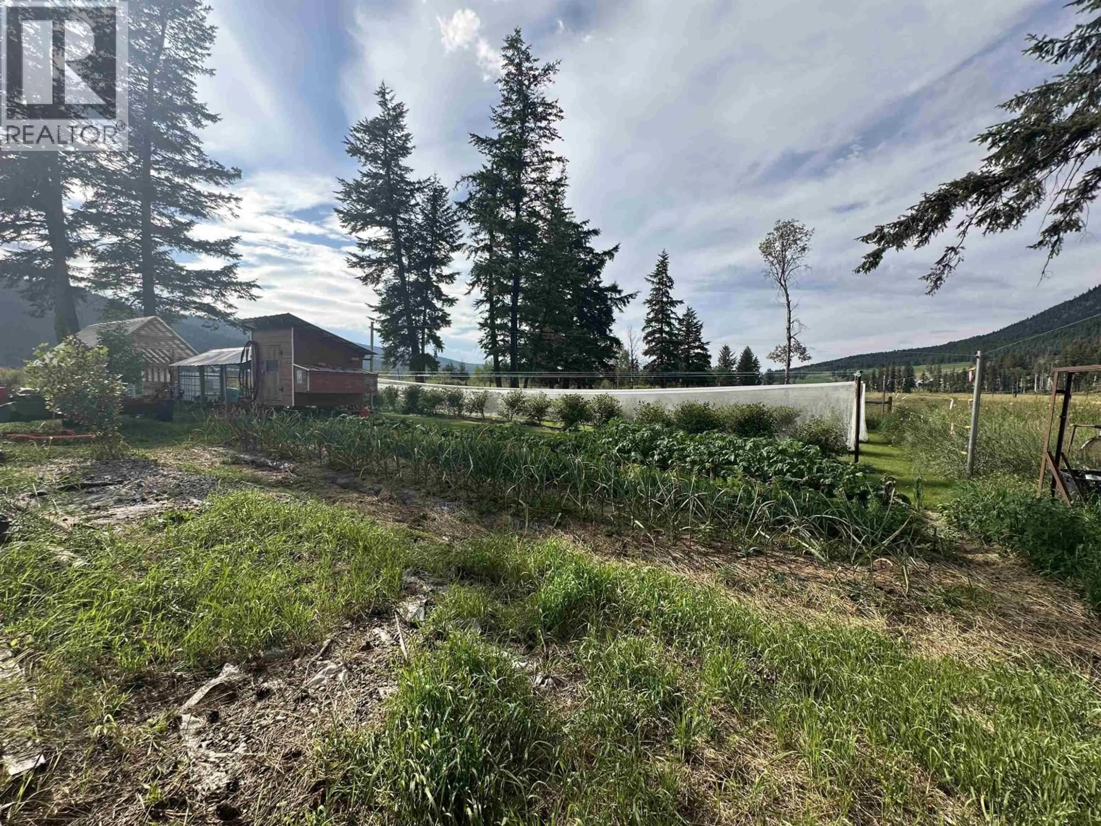 A pic from outside/outdoor area/front of a property/back of a property/a pic from drone, forest/trees view for 8376 SPUR ROAD, McLeese Lake British Columbia V0L1P0