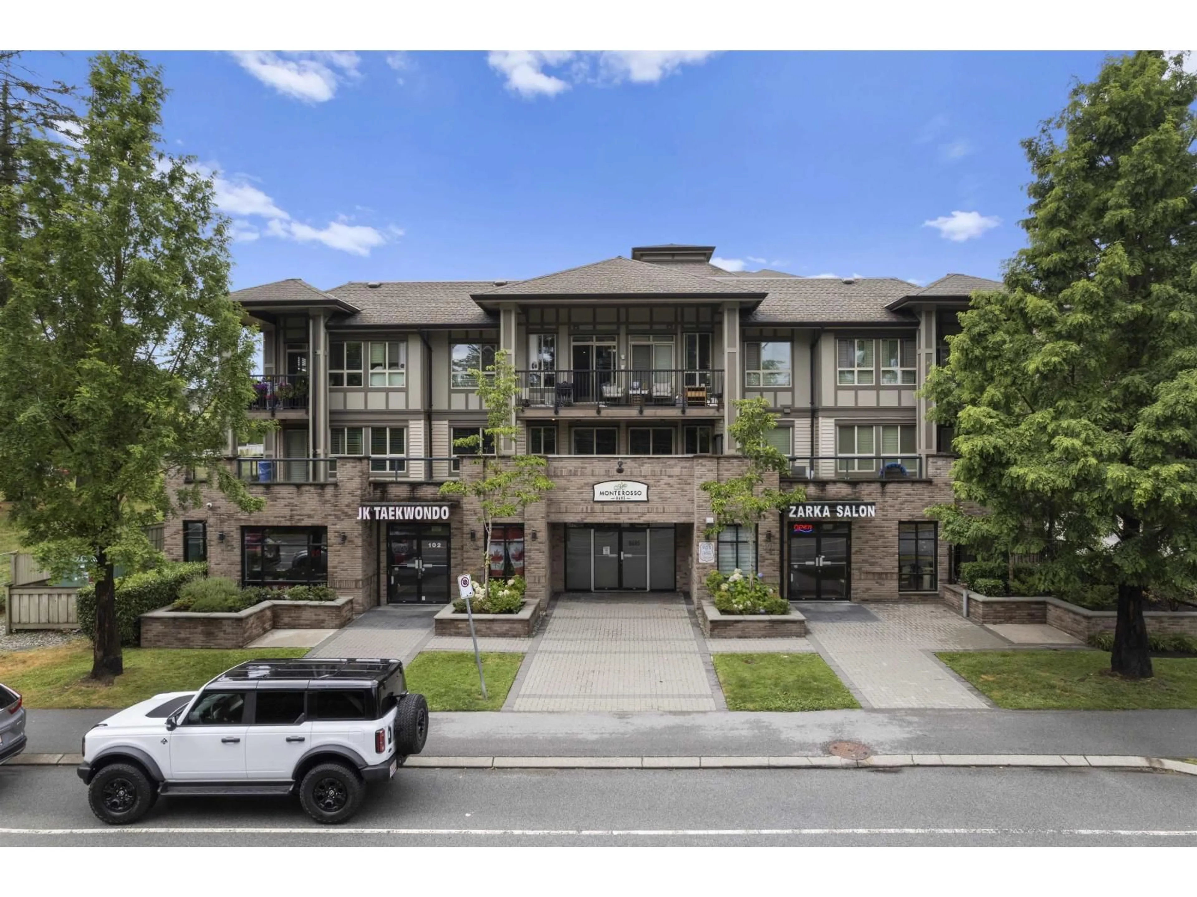 A pic from outside/outdoor area/front of a property/back of a property/a pic from drone, street for 316 - 8695 160, Surrey British Columbia V4N6L6