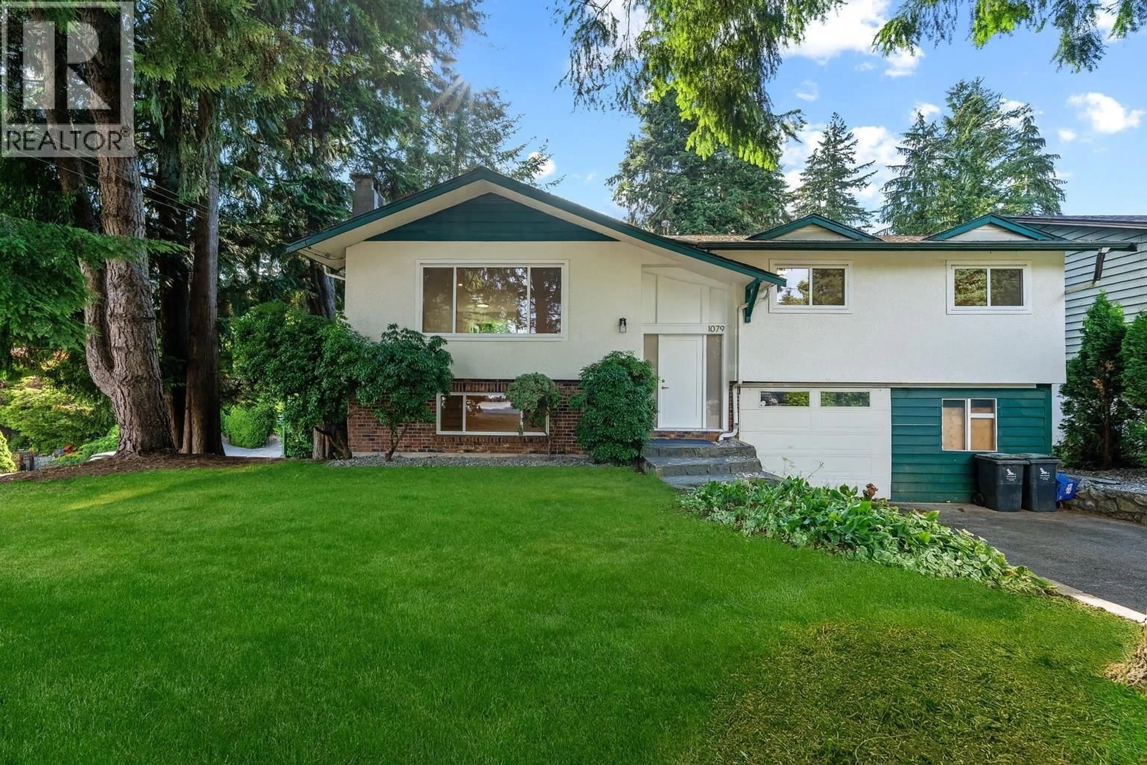 Home with vinyl exterior material, street for 1079 LYTTON STREET, North Vancouver British Columbia V7H2A7