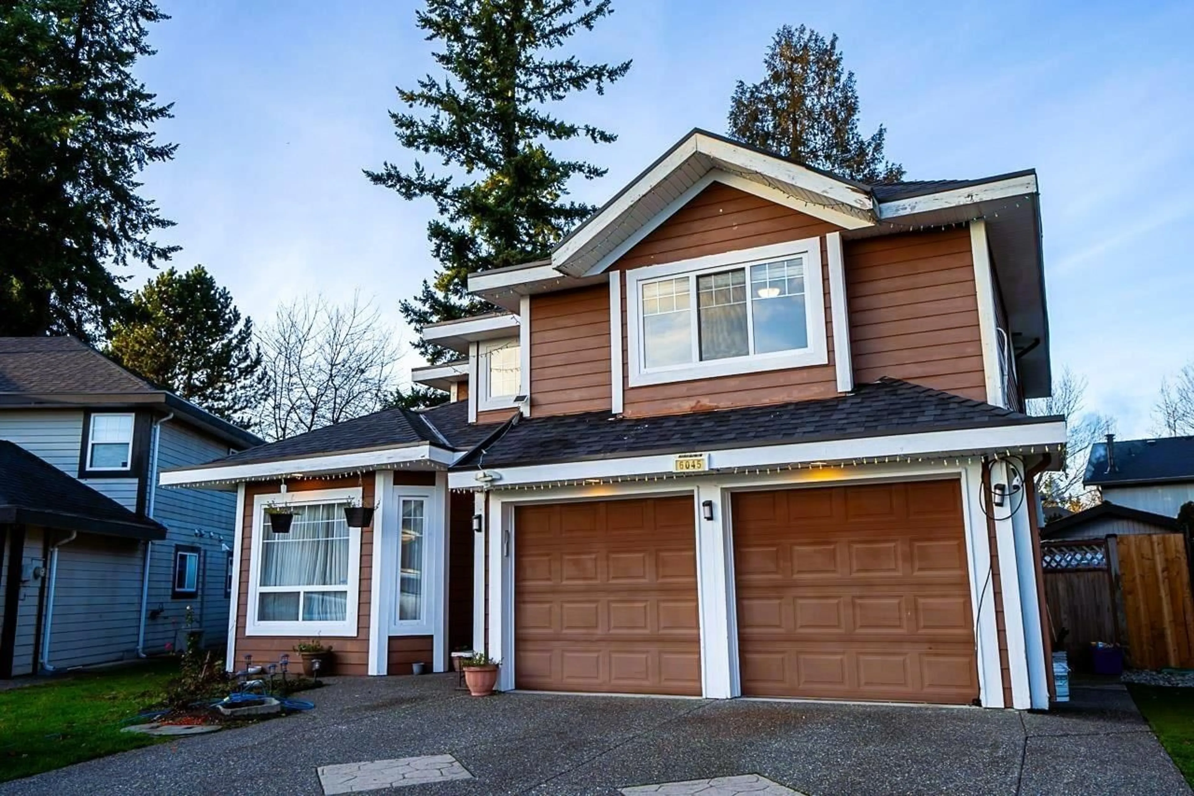 Home with vinyl exterior material, street for 6045 131, Surrey British Columbia V3X3N4