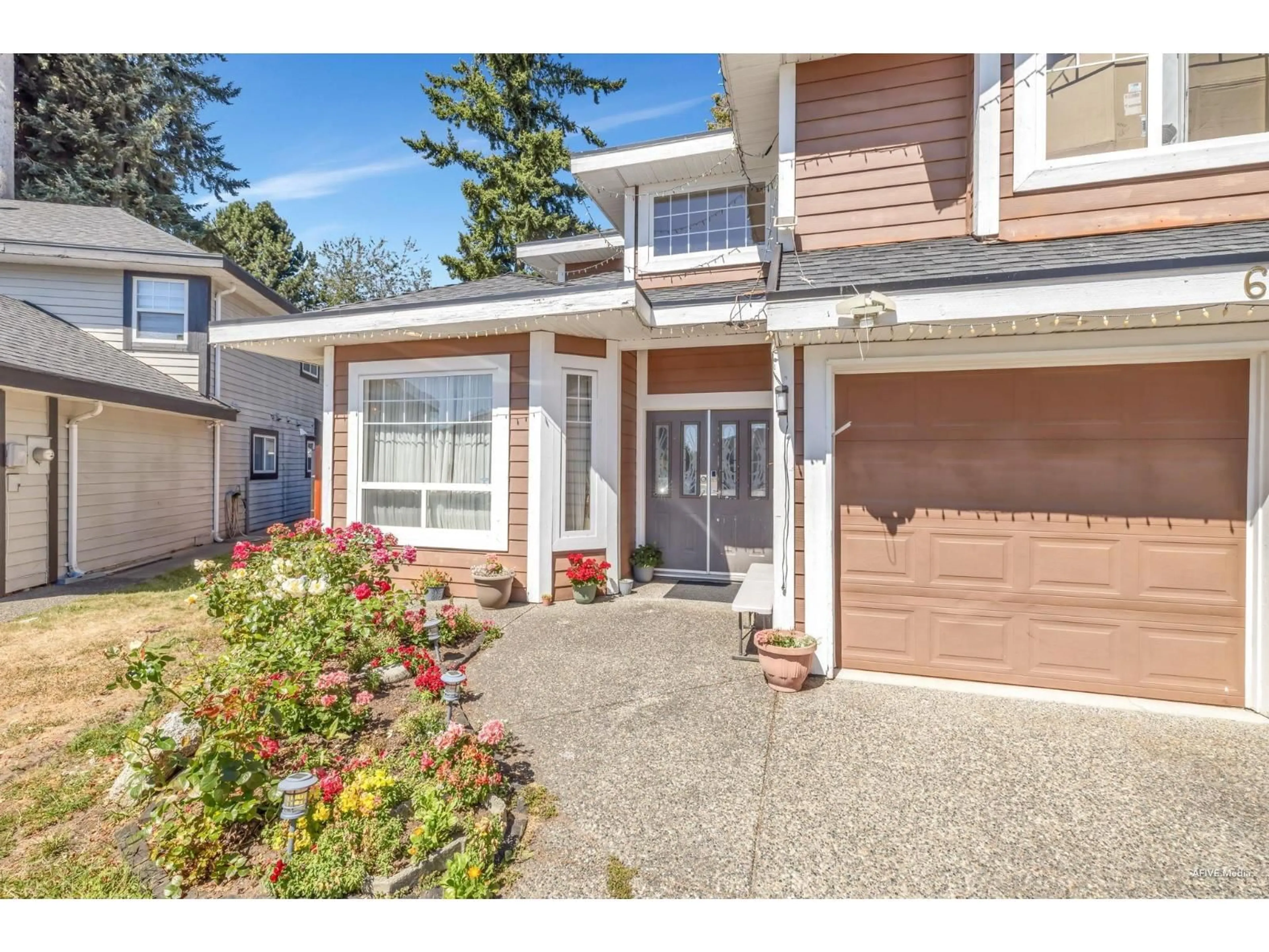 Home with vinyl exterior material, street for 6045 131, Surrey British Columbia V3X3N4