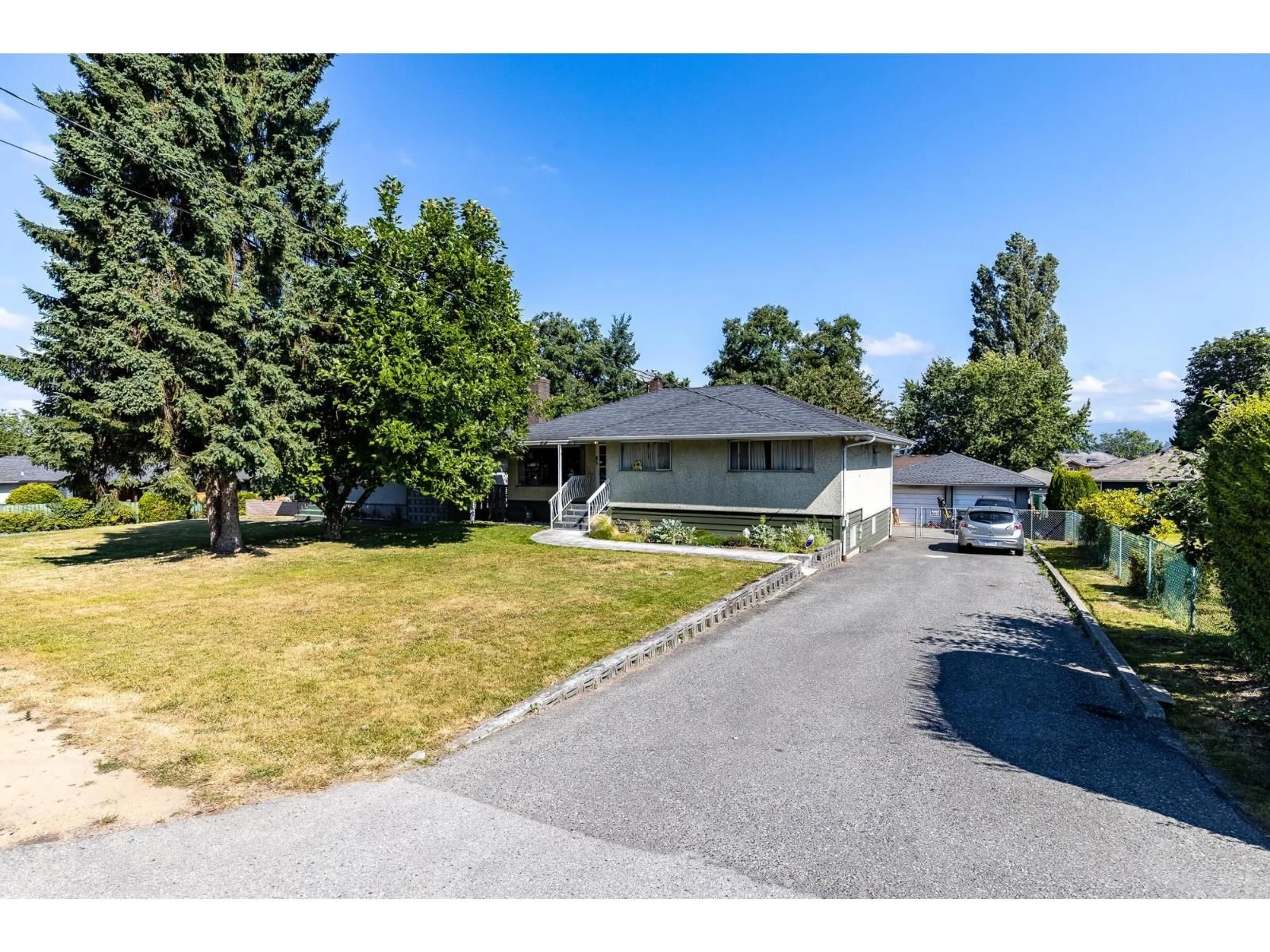 A pic from outside/outdoor area/front of a property/back of a property/a pic from drone, street for 13759 111, Surrey British Columbia V3R2C1