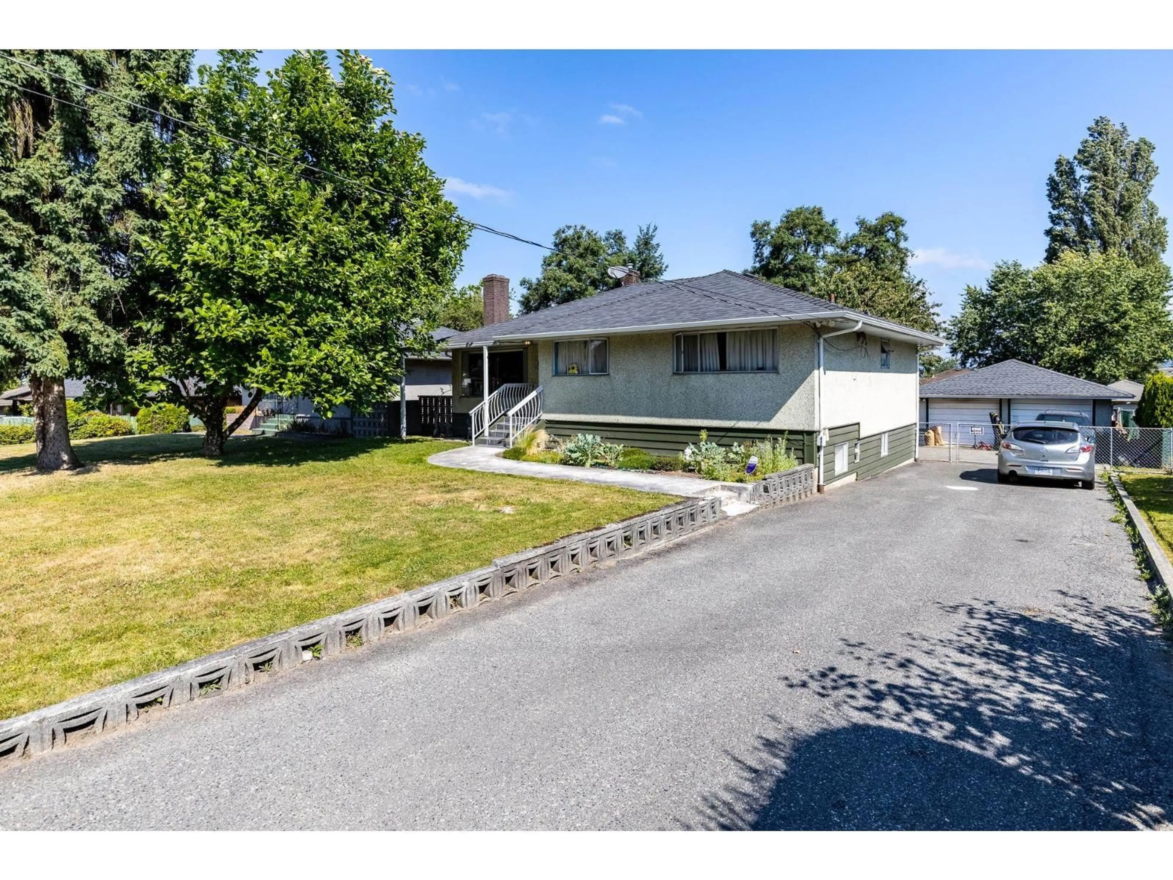 A pic from outside/outdoor area/front of a property/back of a property/a pic from drone, street for 13759 111, Surrey British Columbia V3R2C1