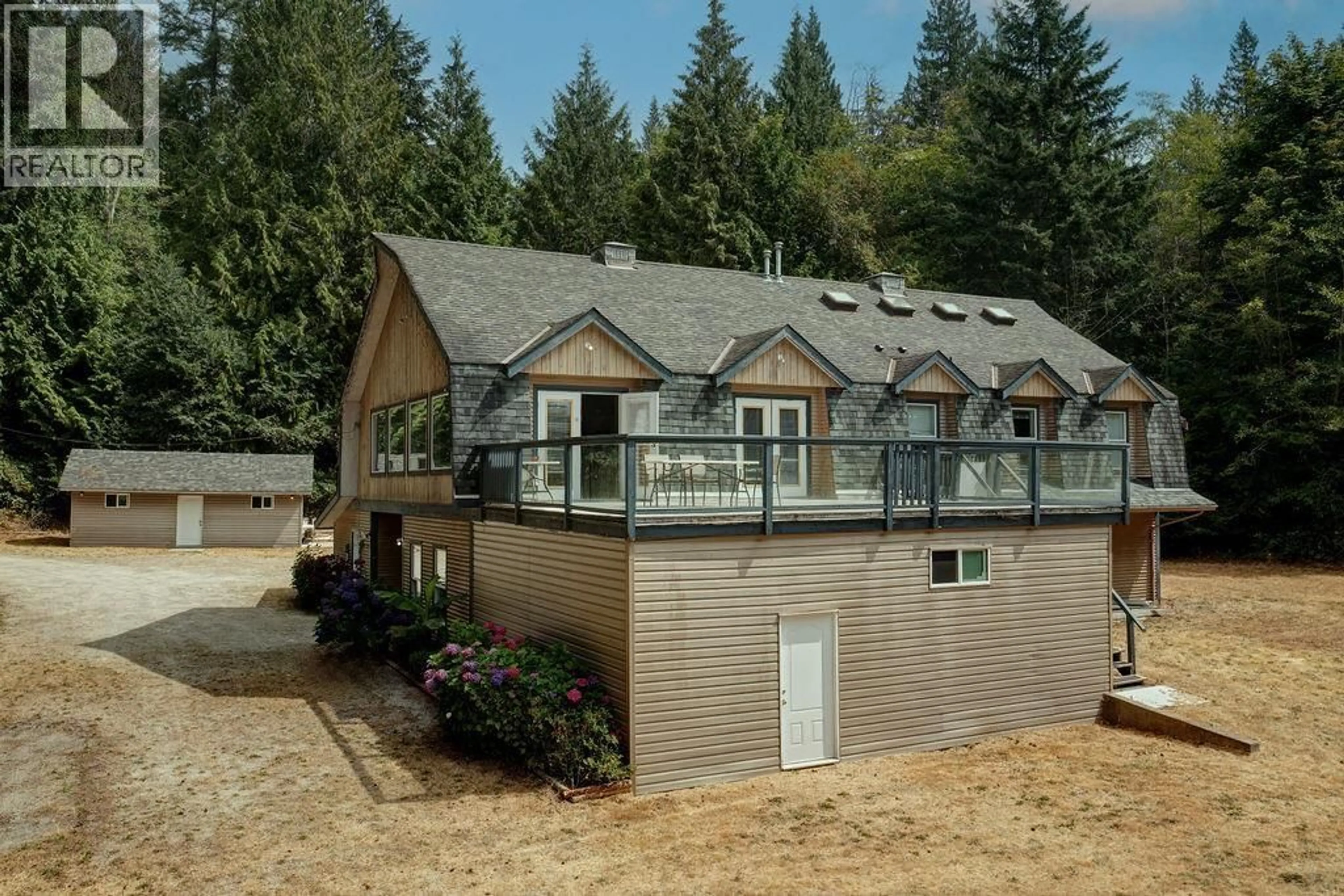 Home with vinyl exterior material, mountain view for 1733 LOWER ROAD, Roberts Creek British Columbia V0N2W6