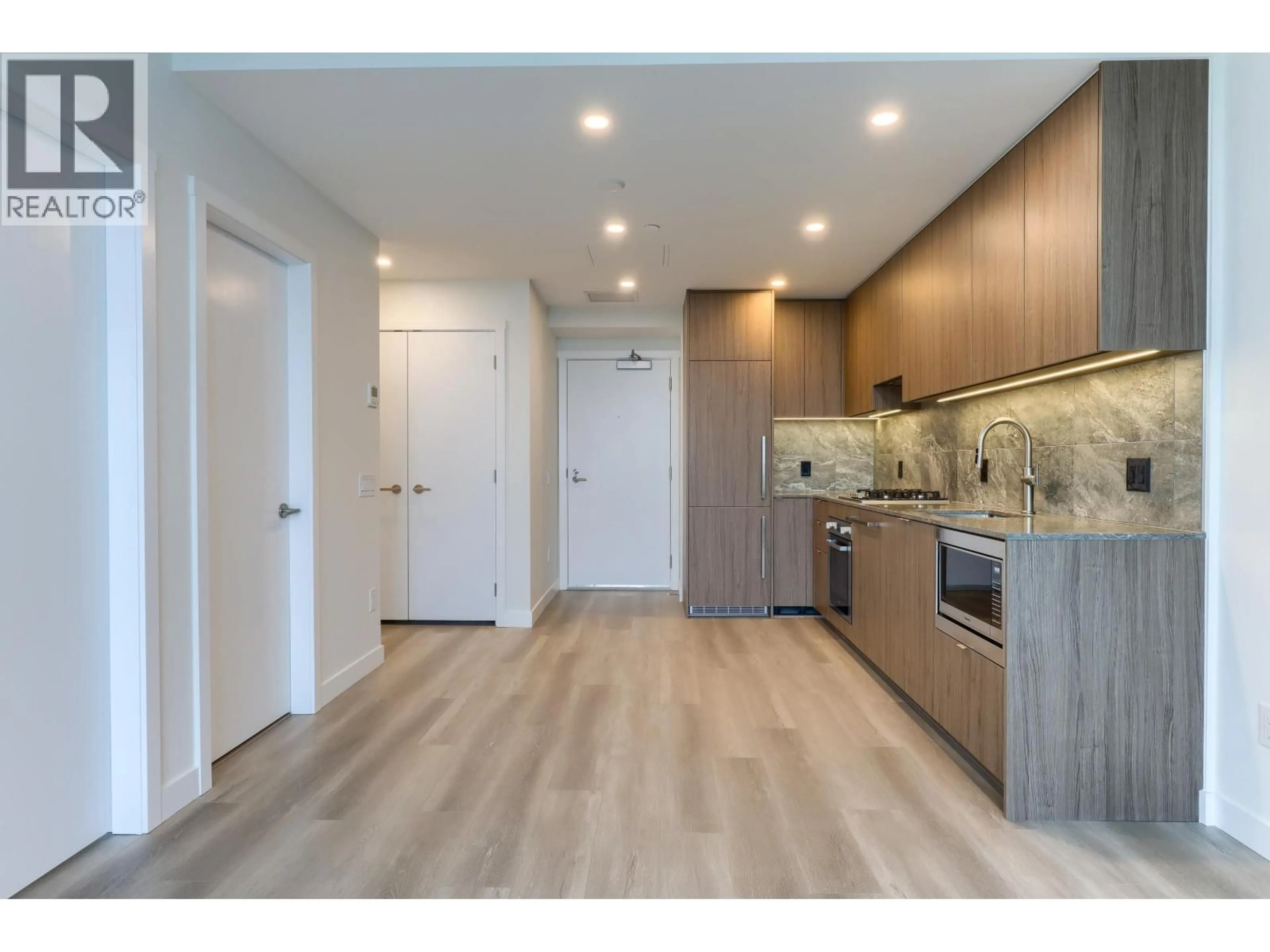 Open concept kitchen, wood/laminate floor for 2004 - 626 CLAREMONT STREET, Coquitlam British Columbia V3J0T1