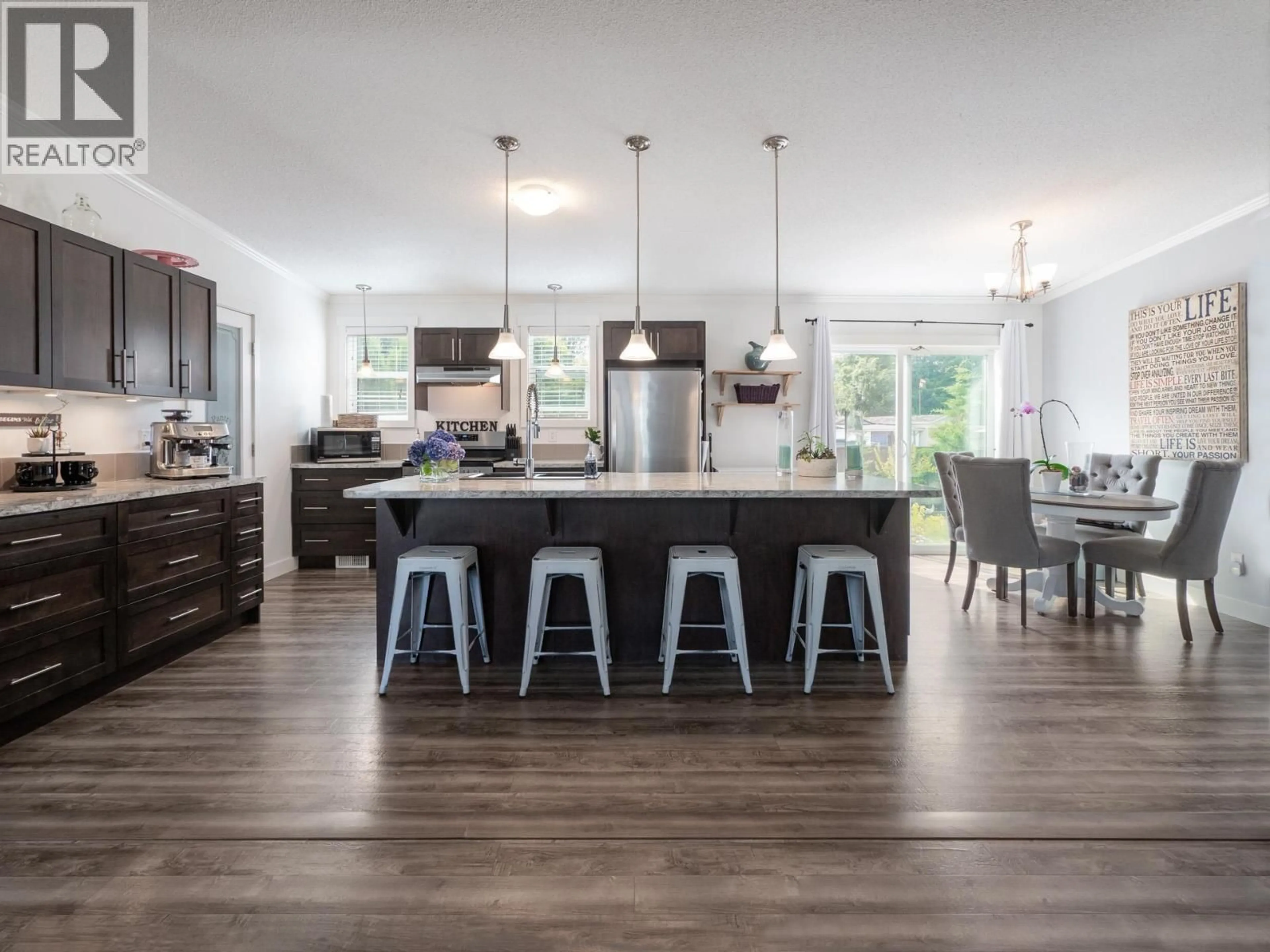 Open concept kitchen, wood/laminate floor for 135 - 1413 SUNSHINE COAST HIGHWAY, Gibsons British Columbia V0N1V5