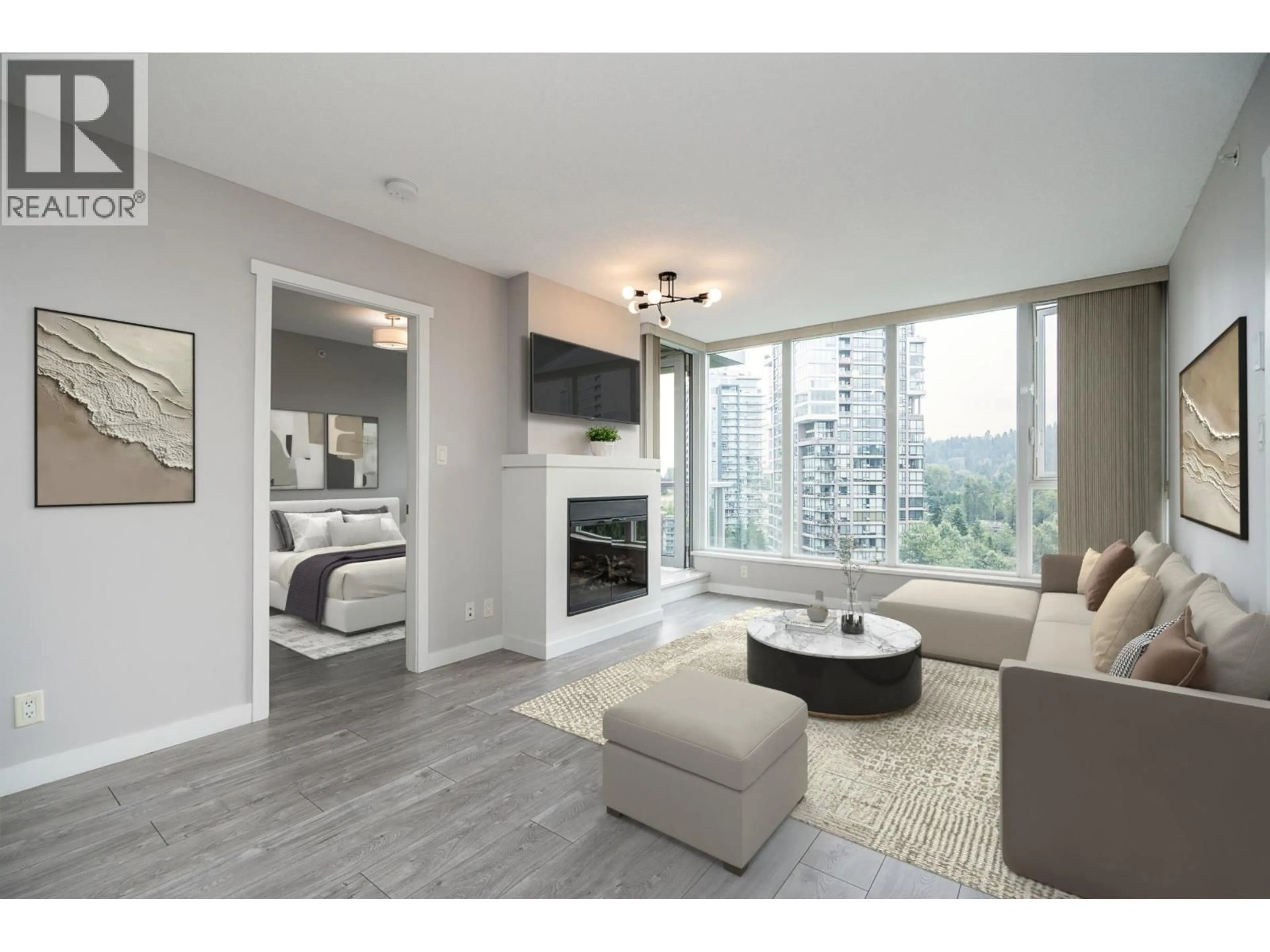 Living room with furniture, wood/laminate floor for 1909 - 660 NOOTKA WAY, Port Moody British Columbia V3H0B7