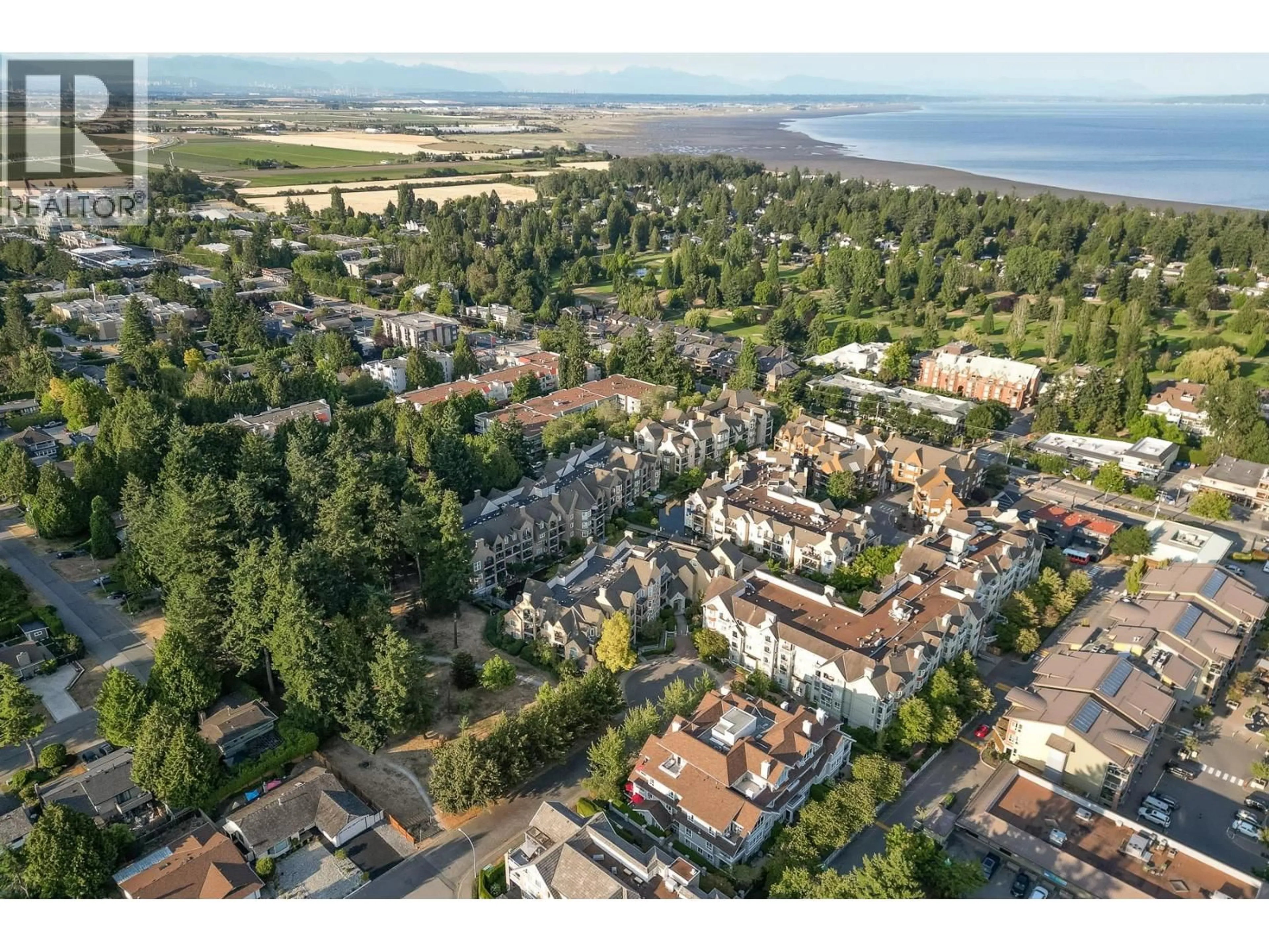 A pic from outside/outdoor area/front of a property/back of a property/a pic from drone, unknown for 105 - 5555 13A AVENUE, Delta British Columbia V4M2E7