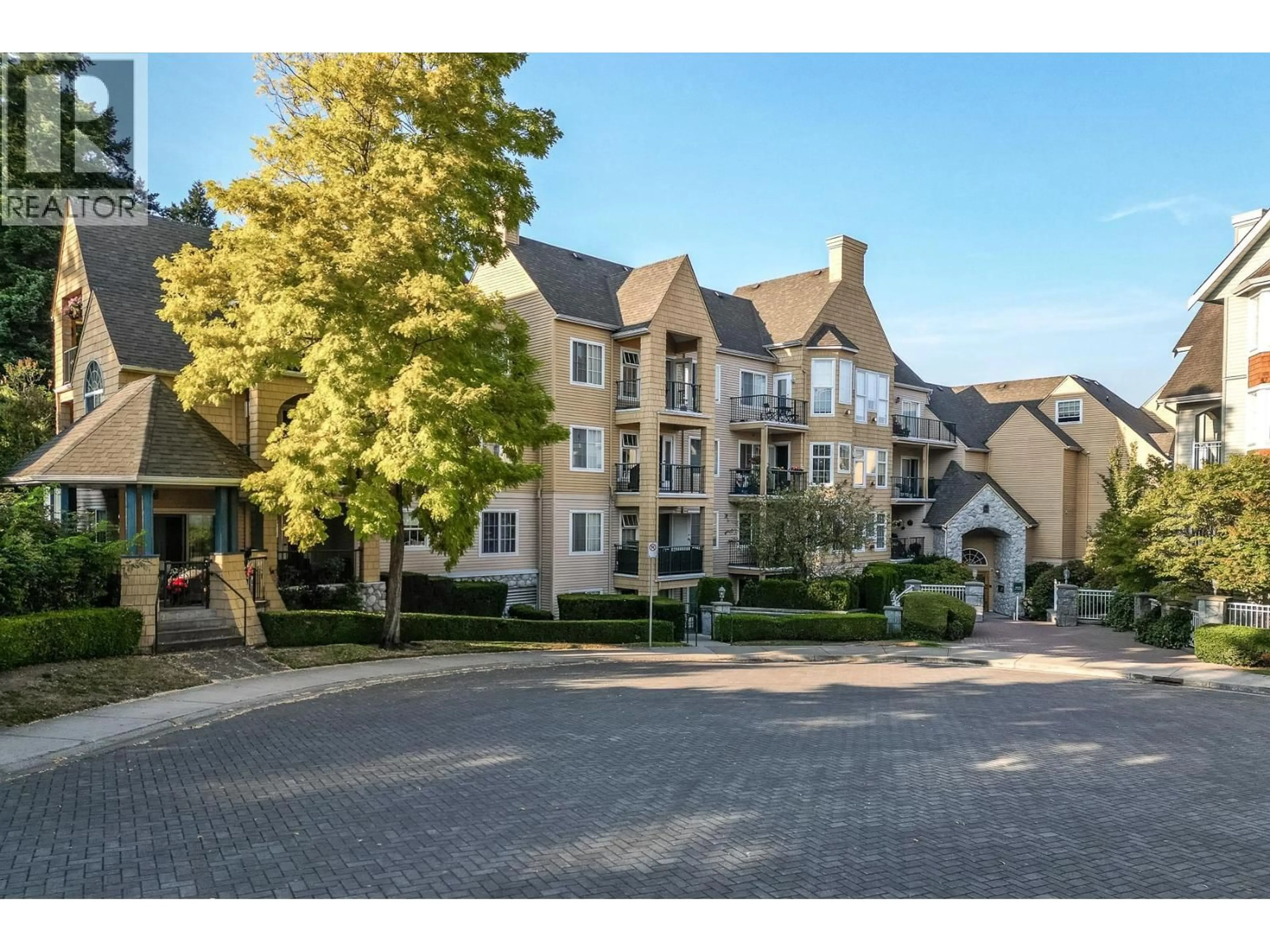 A pic from outside/outdoor area/front of a property/back of a property/a pic from drone, street for 105 - 5555 13A AVENUE, Delta British Columbia V4M2E7