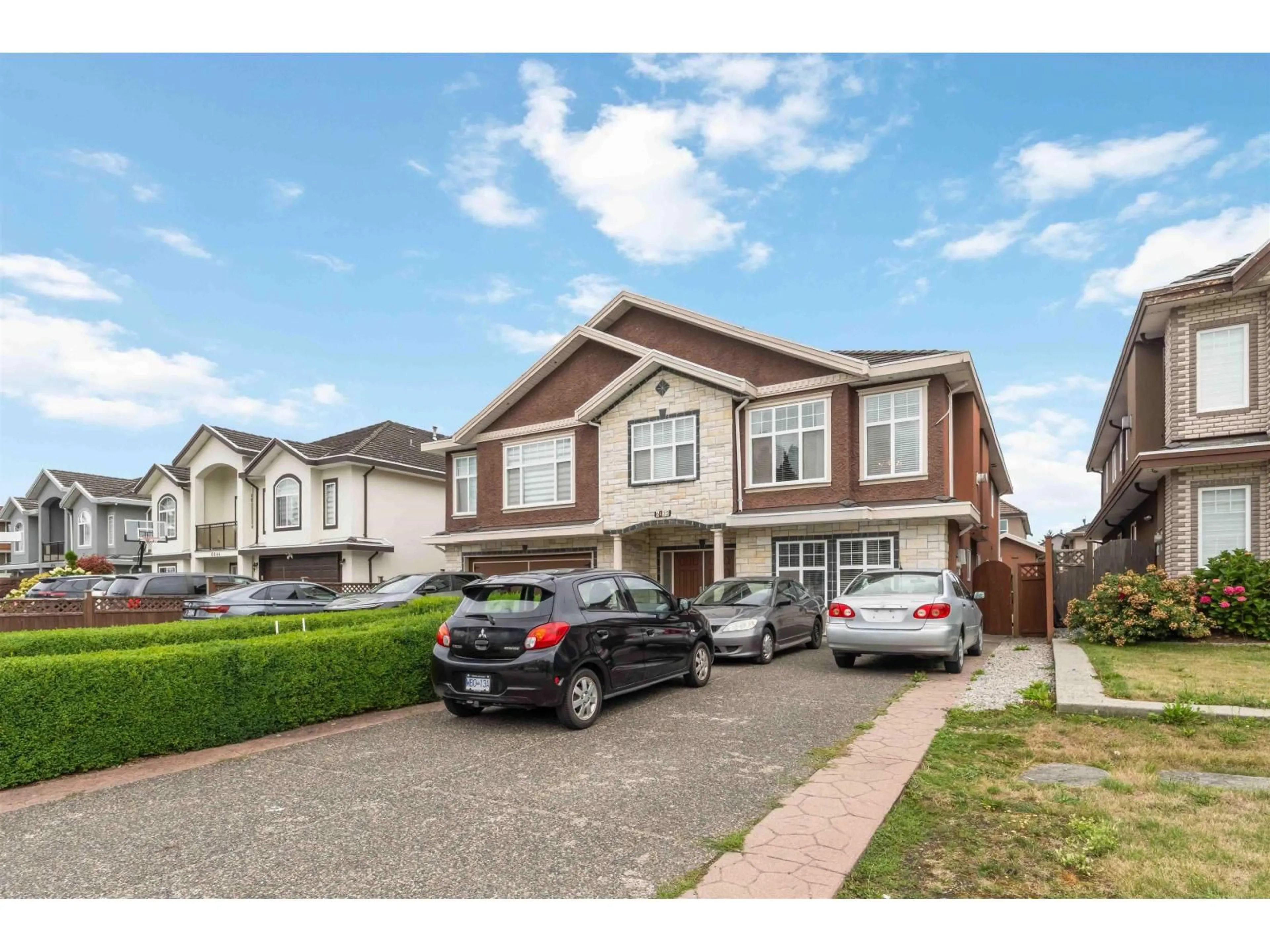 Home with vinyl exterior material, street for 6832 KILBURN, Surrey British Columbia V3W6H5