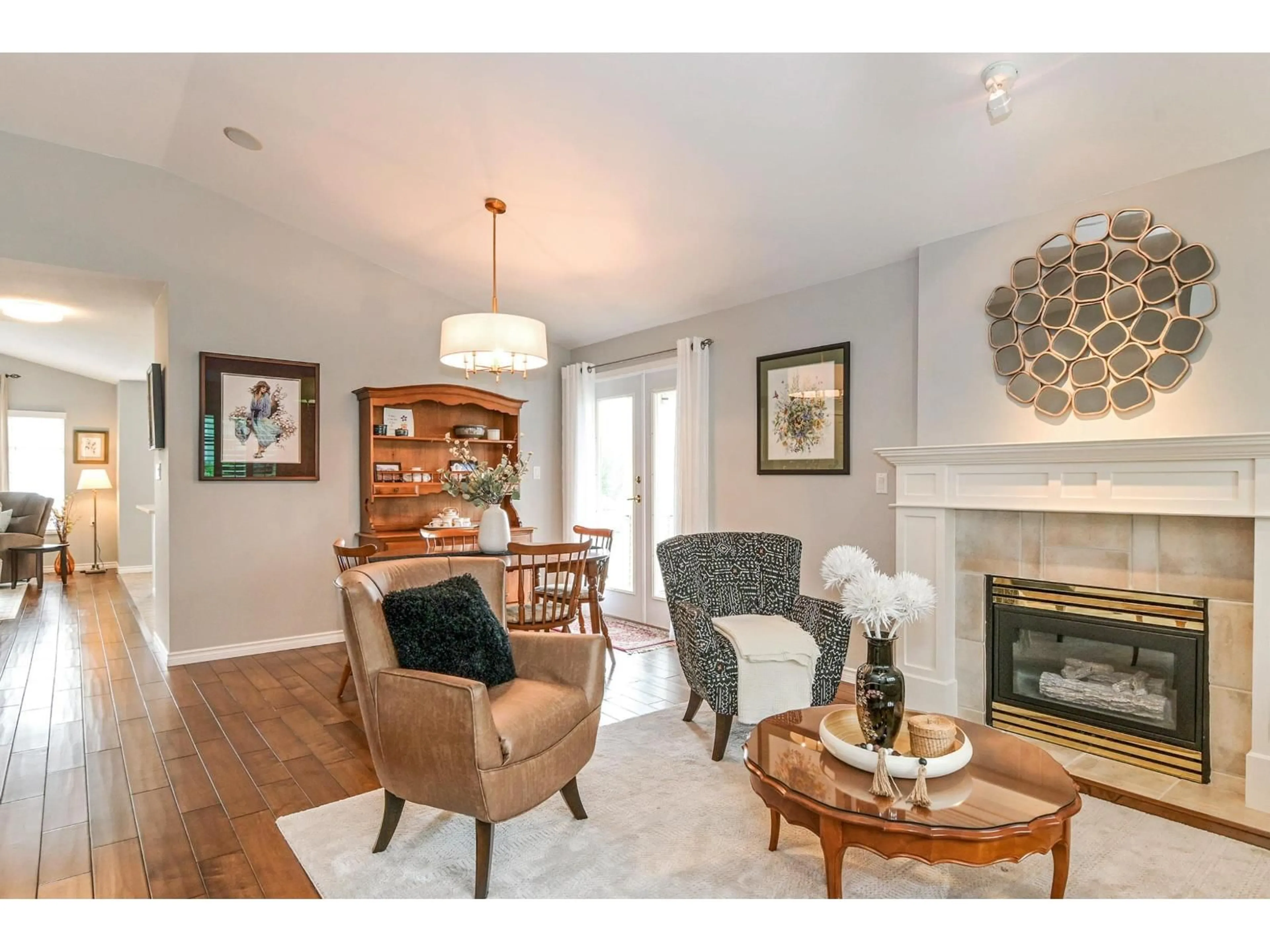 Living room with furniture, wood/laminate floor for 30 - 5700 JINKERSON ROAD, Chilliwack British Columbia V2R5N6