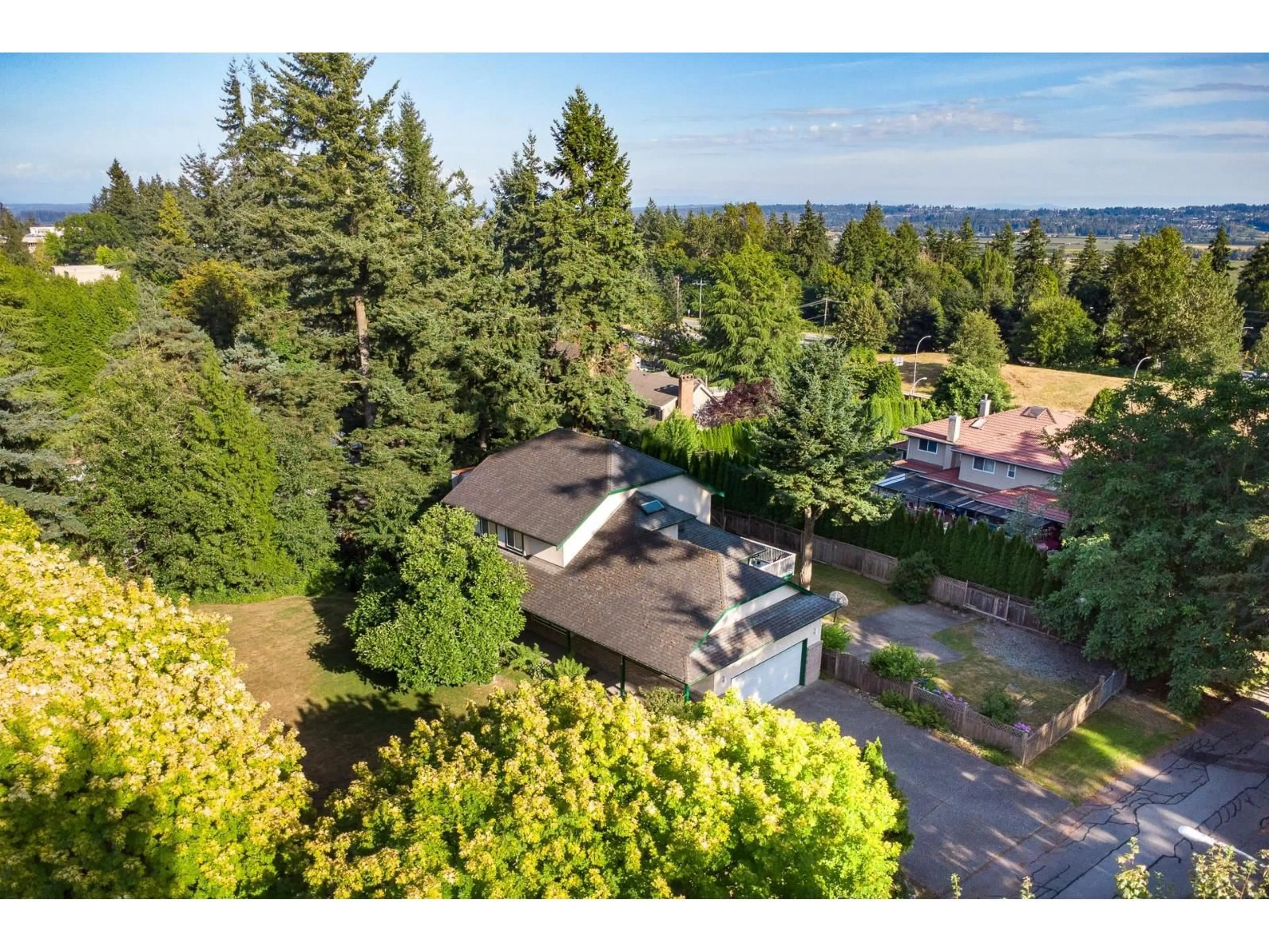 A pic from outside/outdoor area/front of a property/back of a property/a pic from drone, water/lake/river/ocean view for 14110 57, Surrey British Columbia V3X2W6