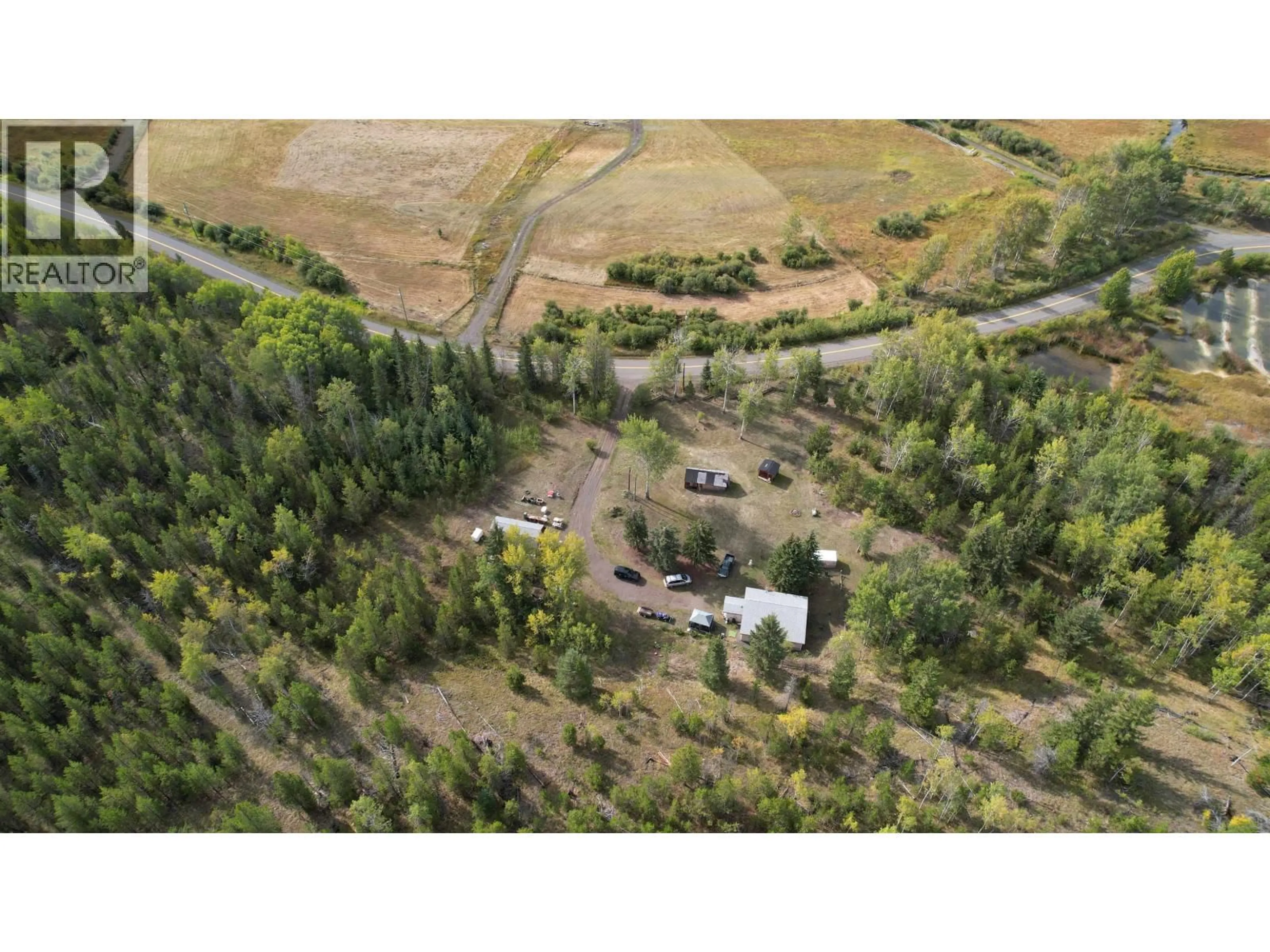 A pic from outside/outdoor area/front of a property/back of a property/a pic from drone, unknown for 8043 83 MILE ROAD, Lone Butte British Columbia V0K2K1
