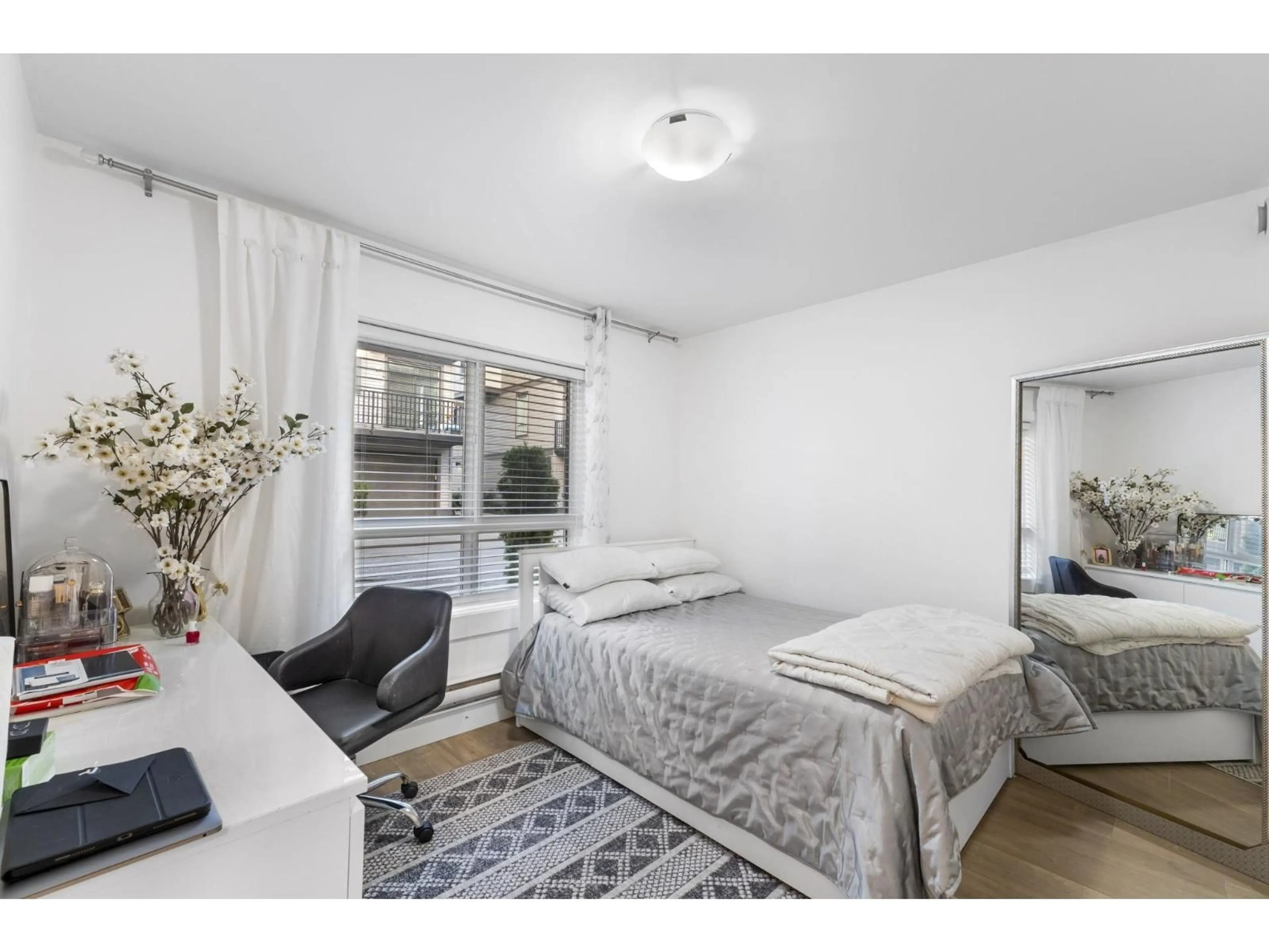 Bedroom with bed, wood/laminate floor for 14 - 19670 55A, Langley British Columbia V3A0M1