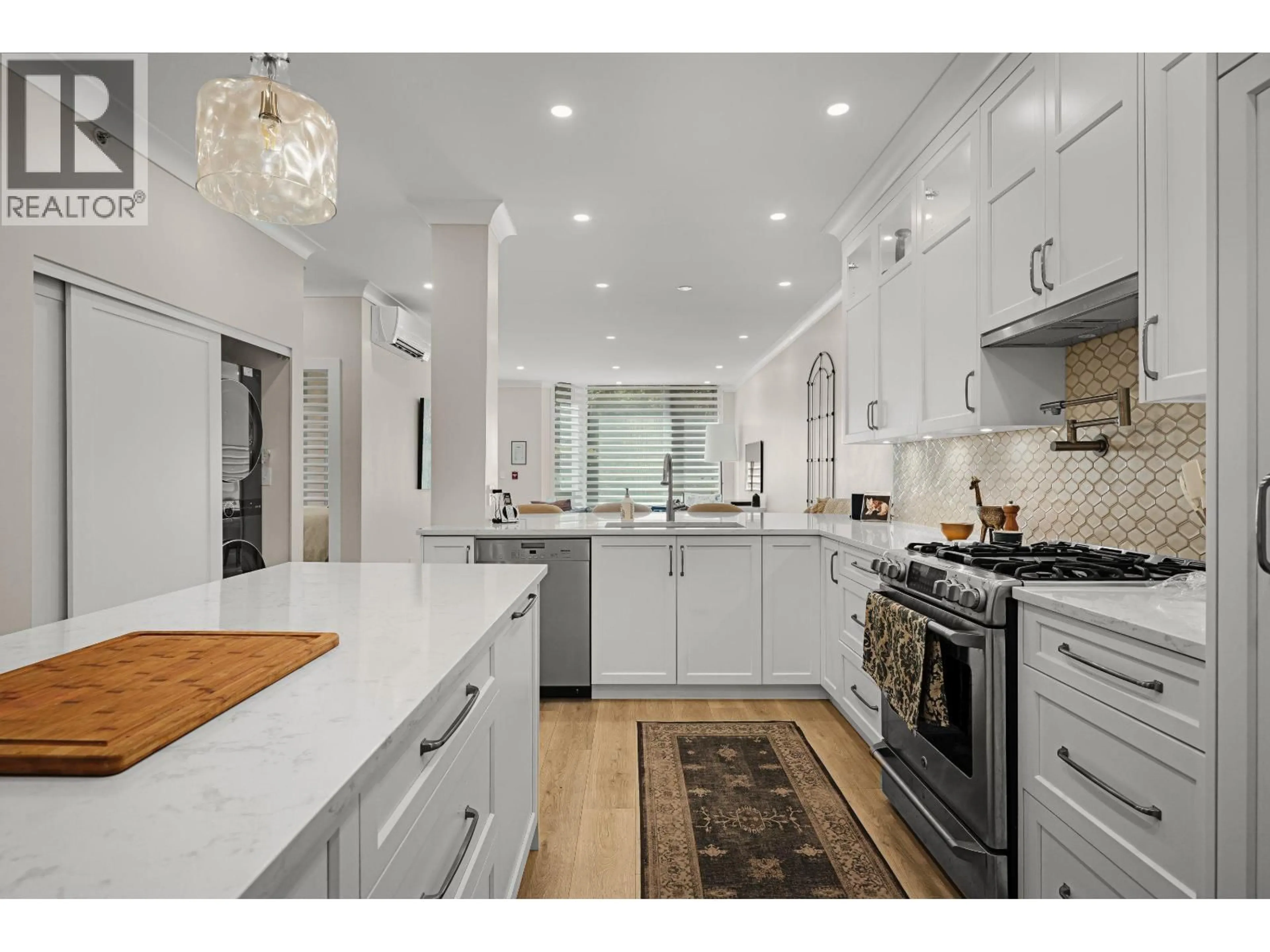 Open concept kitchen, unknown for 102 - 1488 HORNBY STREET, Vancouver British Columbia V6Z1X3