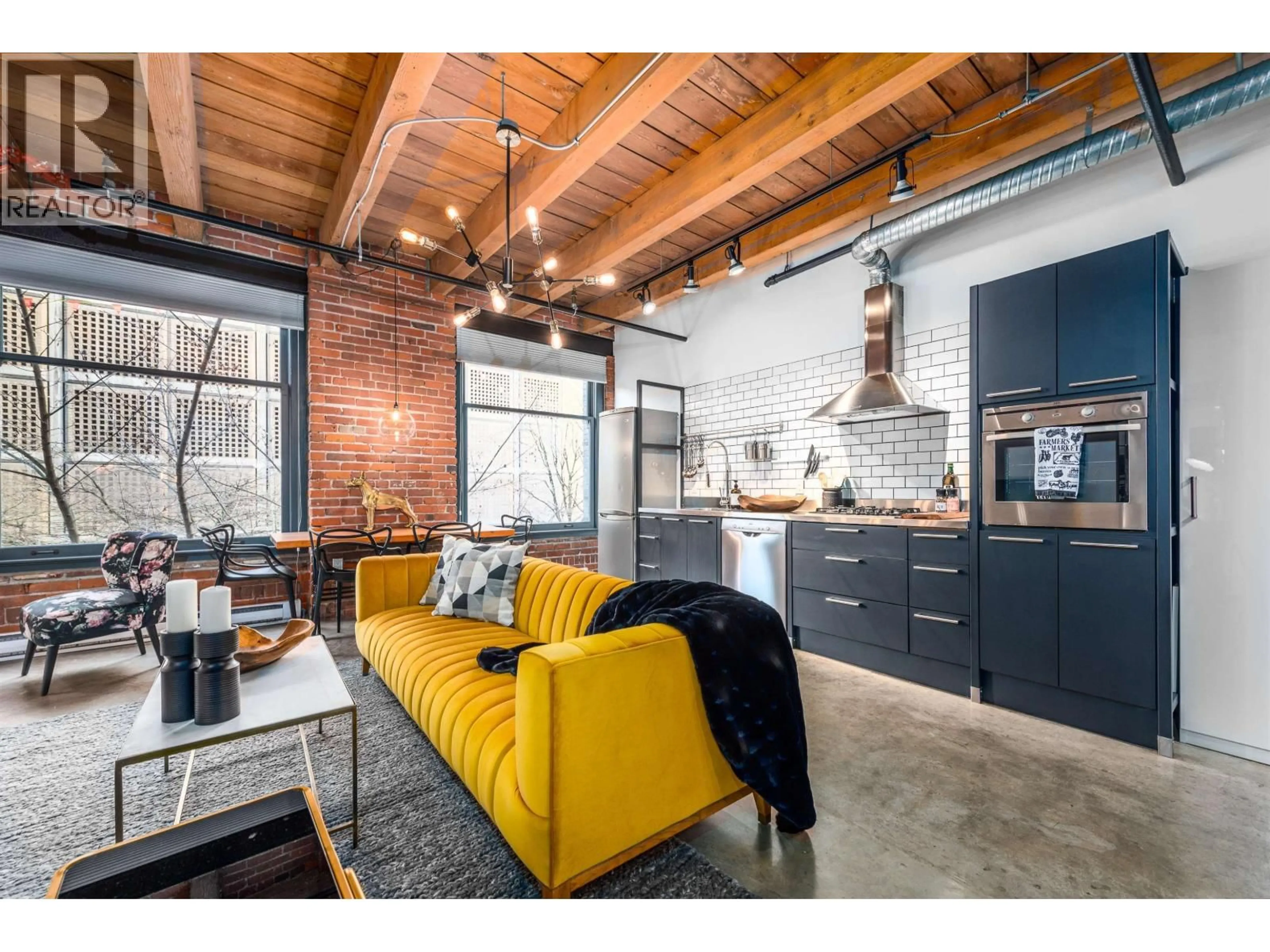 Open concept kitchen, cement floor for 209 - 55 CORDOVA STREET, Vancouver British Columbia V6A0A5