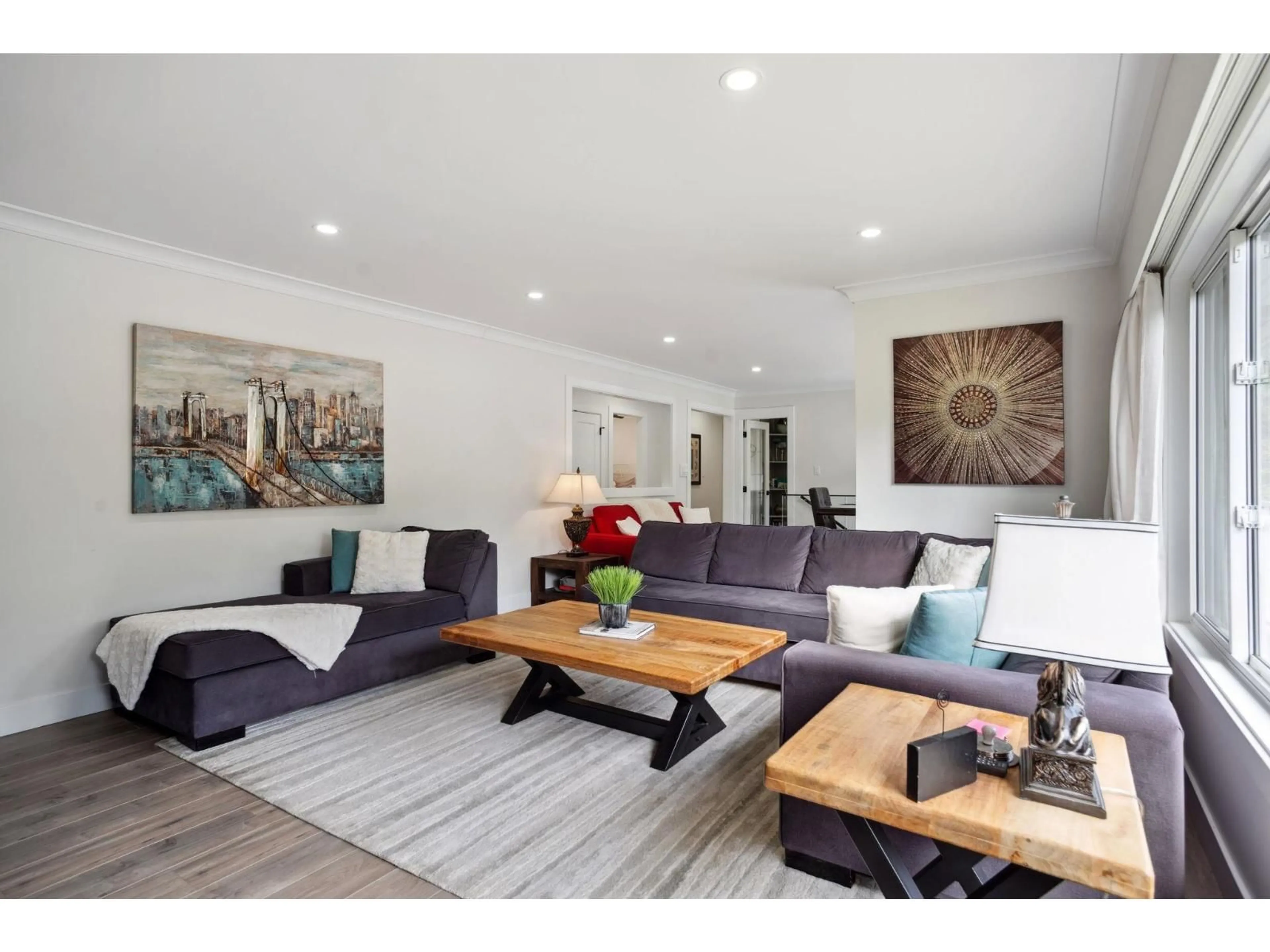 Living room with furniture, wood/laminate floor for 11159 MASON, Delta British Columbia V4E1G1