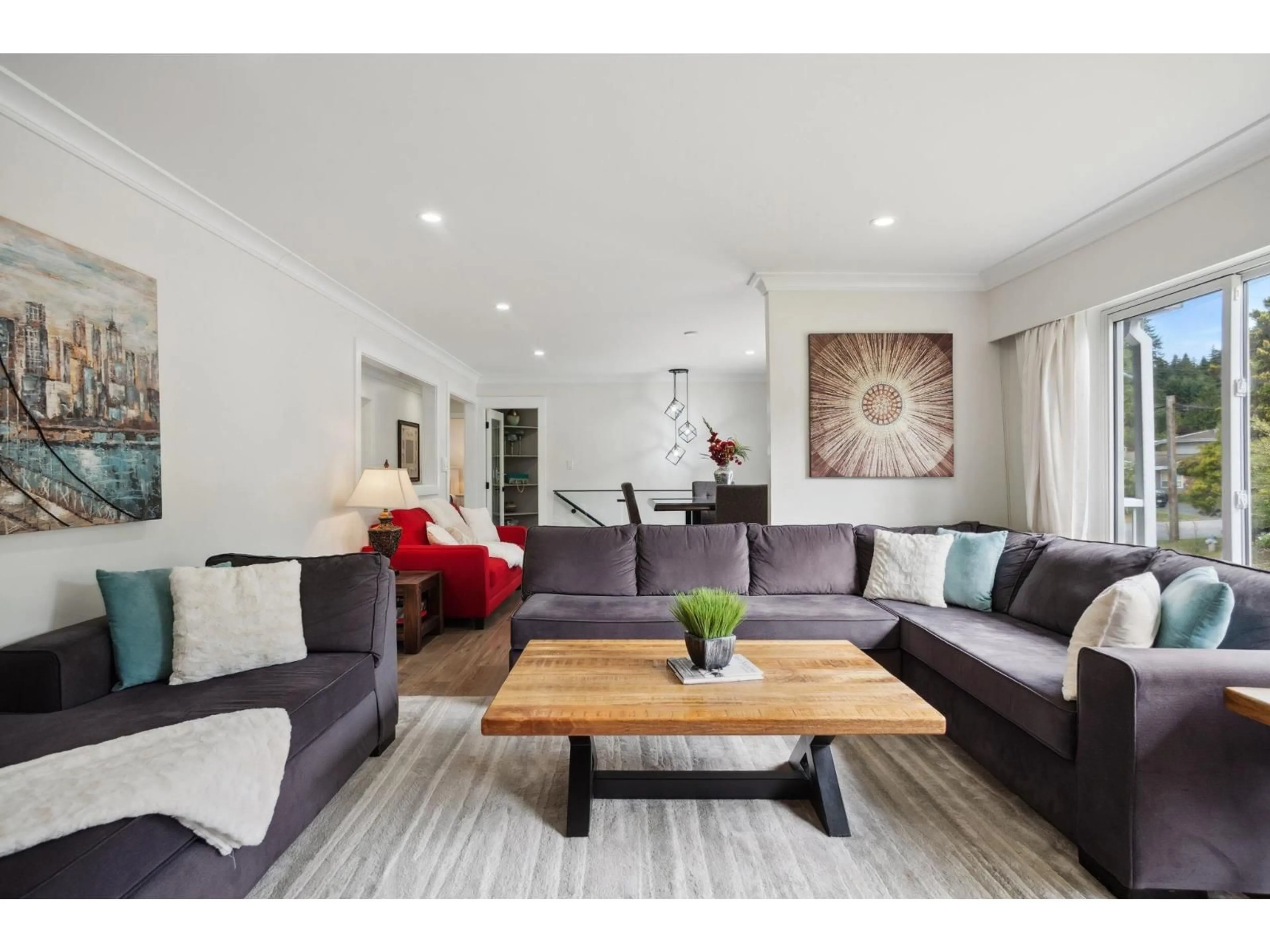 Living room with furniture, wood/laminate floor for 11159 MASON, Delta British Columbia V4E1G1