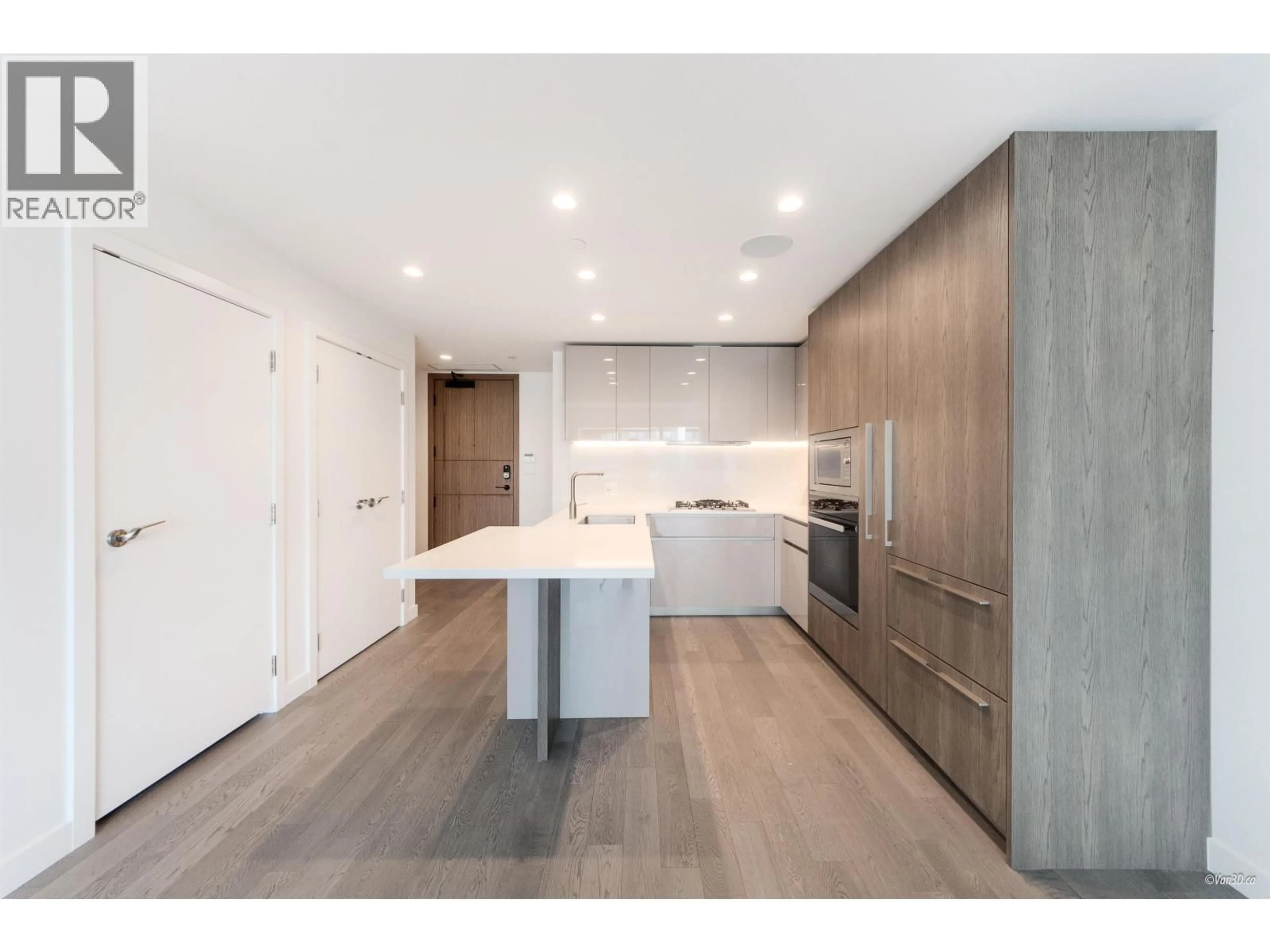 Open concept kitchen, wood/laminate floor for 202 - 6811 PEARSON WAY, Richmond British Columbia V7C0E7