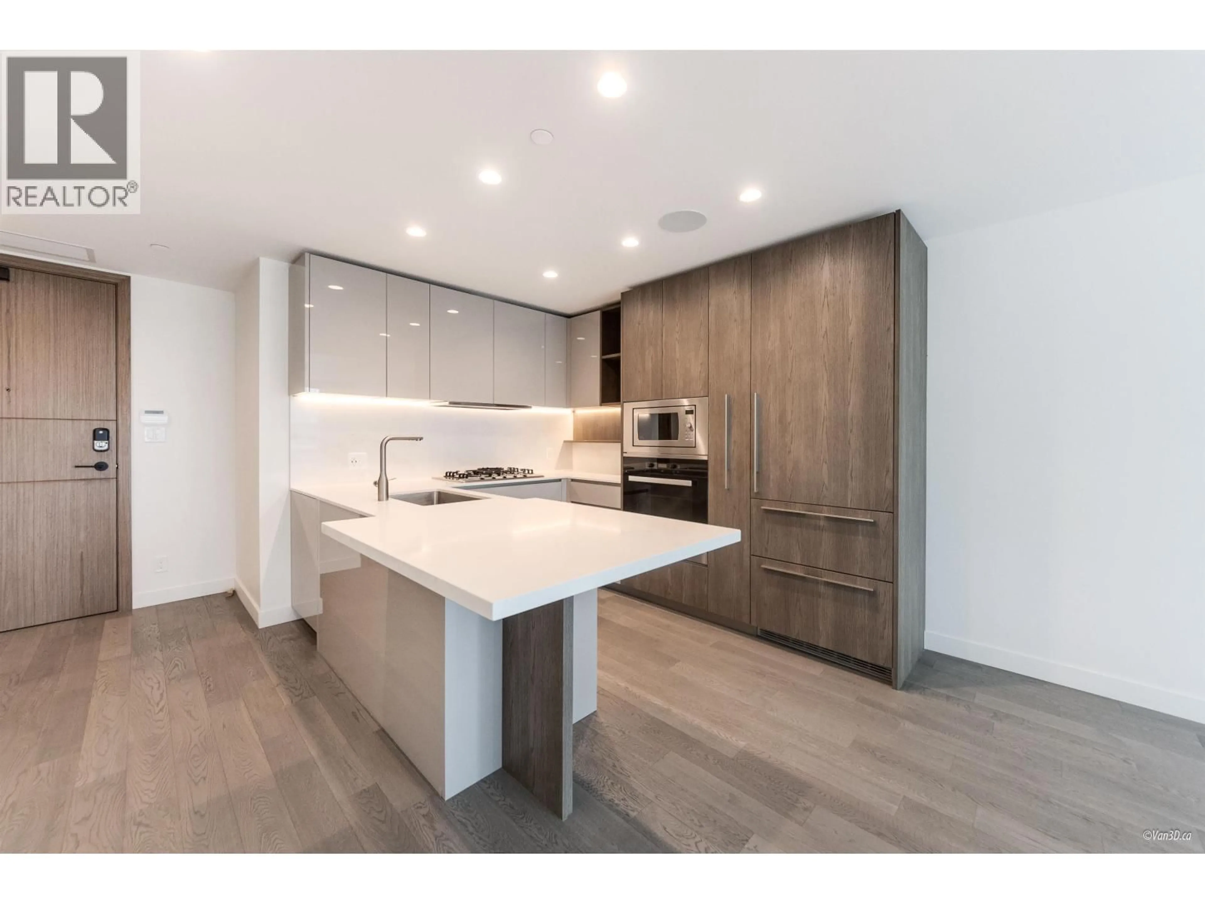 Open concept kitchen, wood/laminate floor for 202 - 6811 PEARSON WAY, Richmond British Columbia V7C0E7