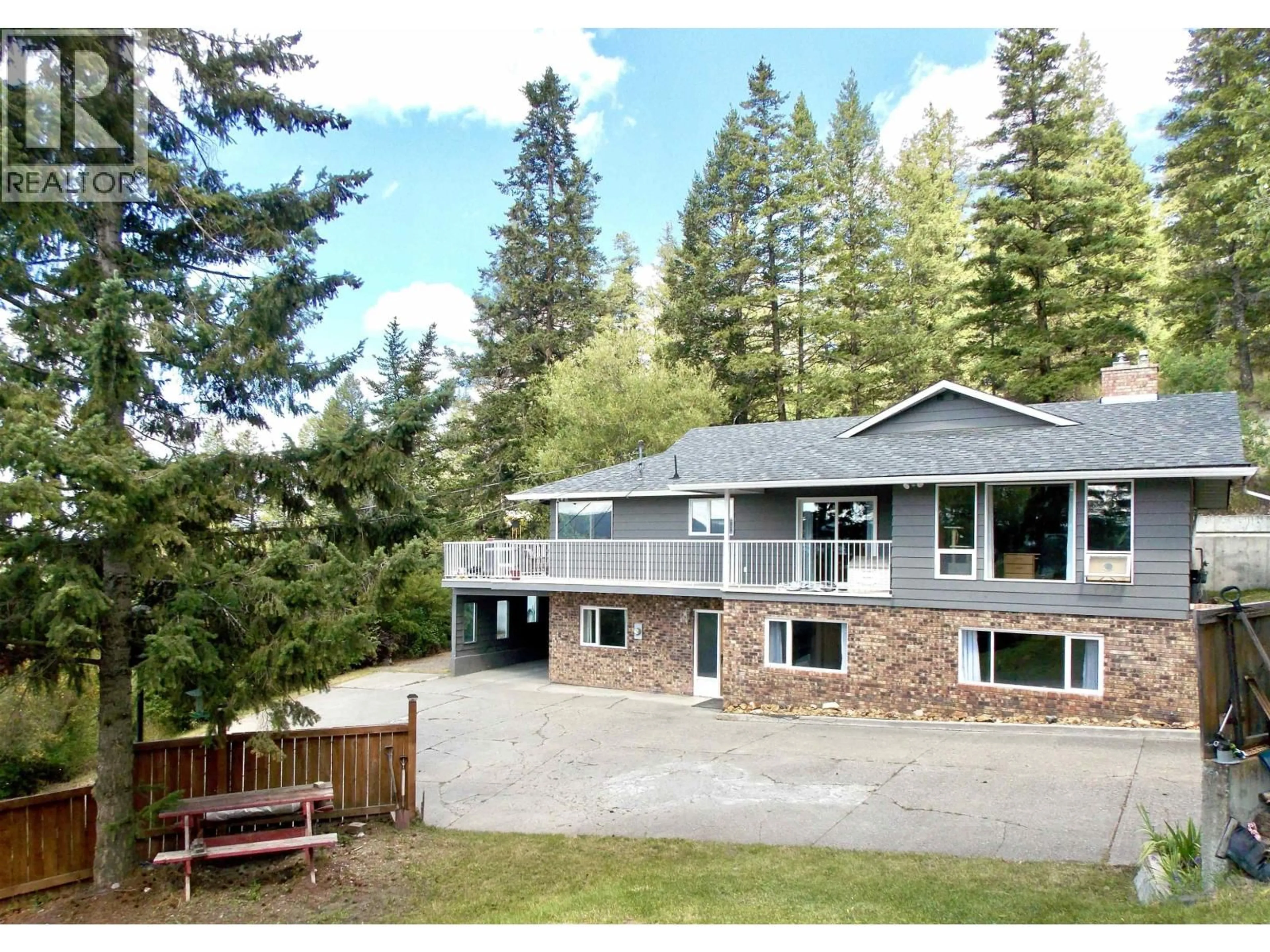 A pic from outside/outdoor area/front of a property/back of a property/a pic from drone, mountain view for 690 CENTENNIAL DRIVE, Williams Lake British Columbia V2G4B5