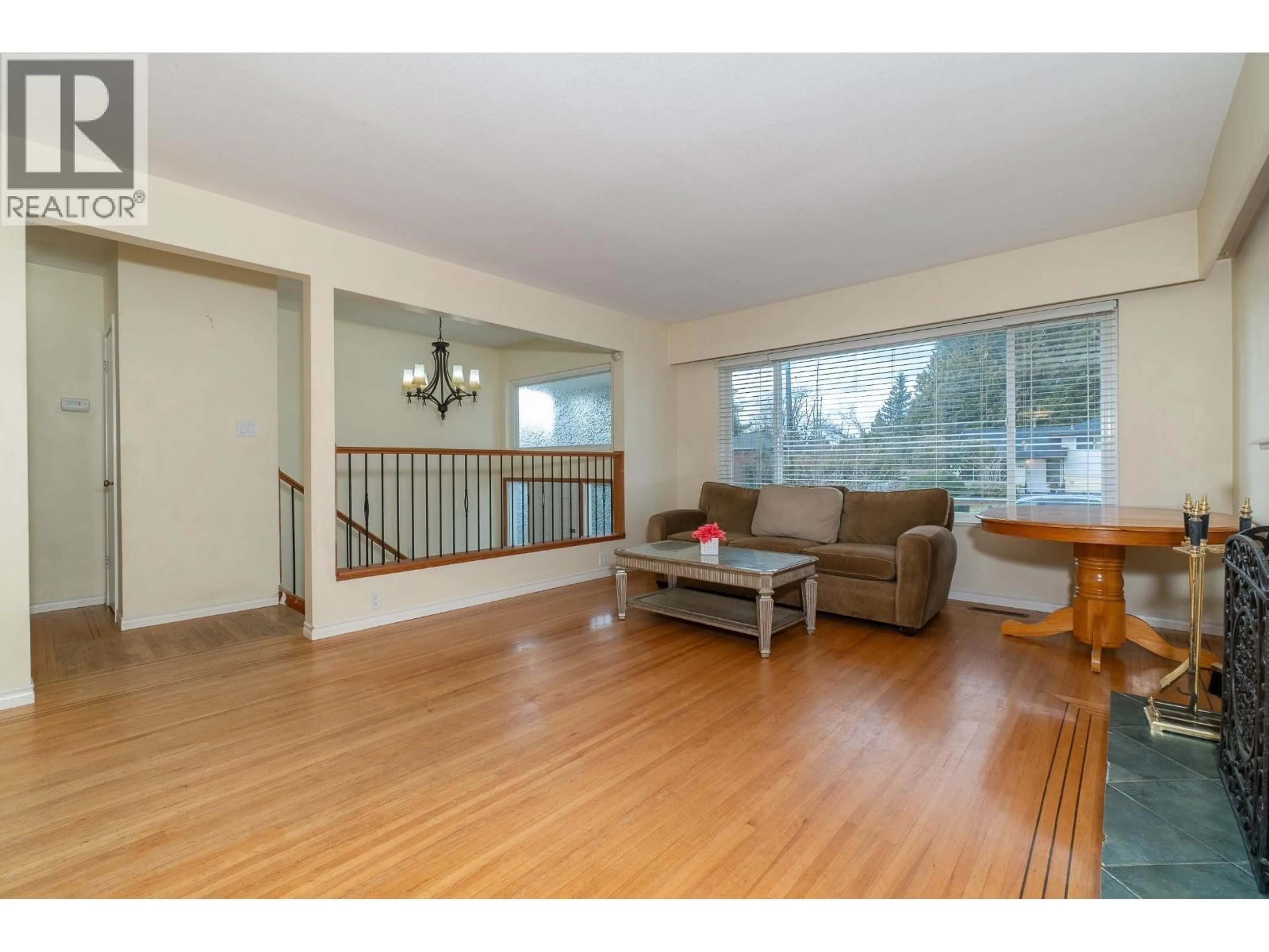 Living room with furniture, wood/laminate floor for 699 DUVAL COURT, Coquitlam British Columbia V3J3L2