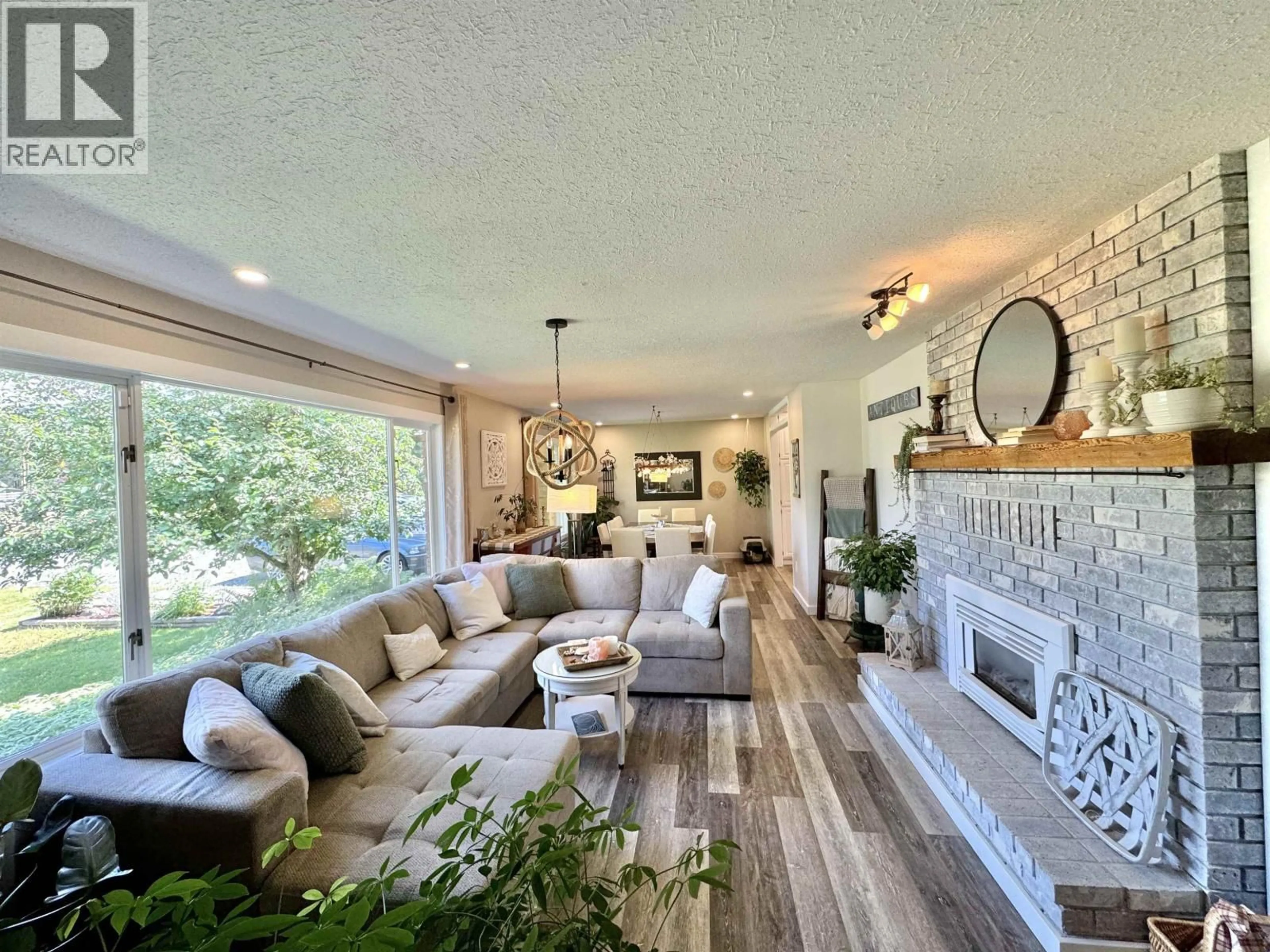 Living room with furniture, unknown for 3278 EAGLE WAY, 150 Mile House British Columbia V0K2G0