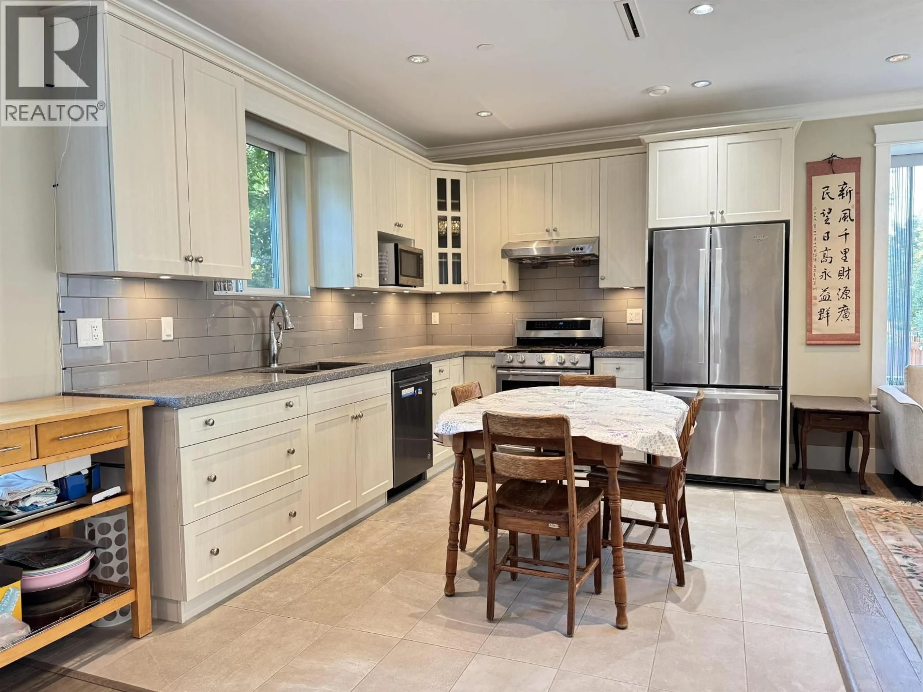 Open concept kitchen, ceramic/tile floor for 5828 QUEBEC STREET, Vancouver British Columbia V5W2N9