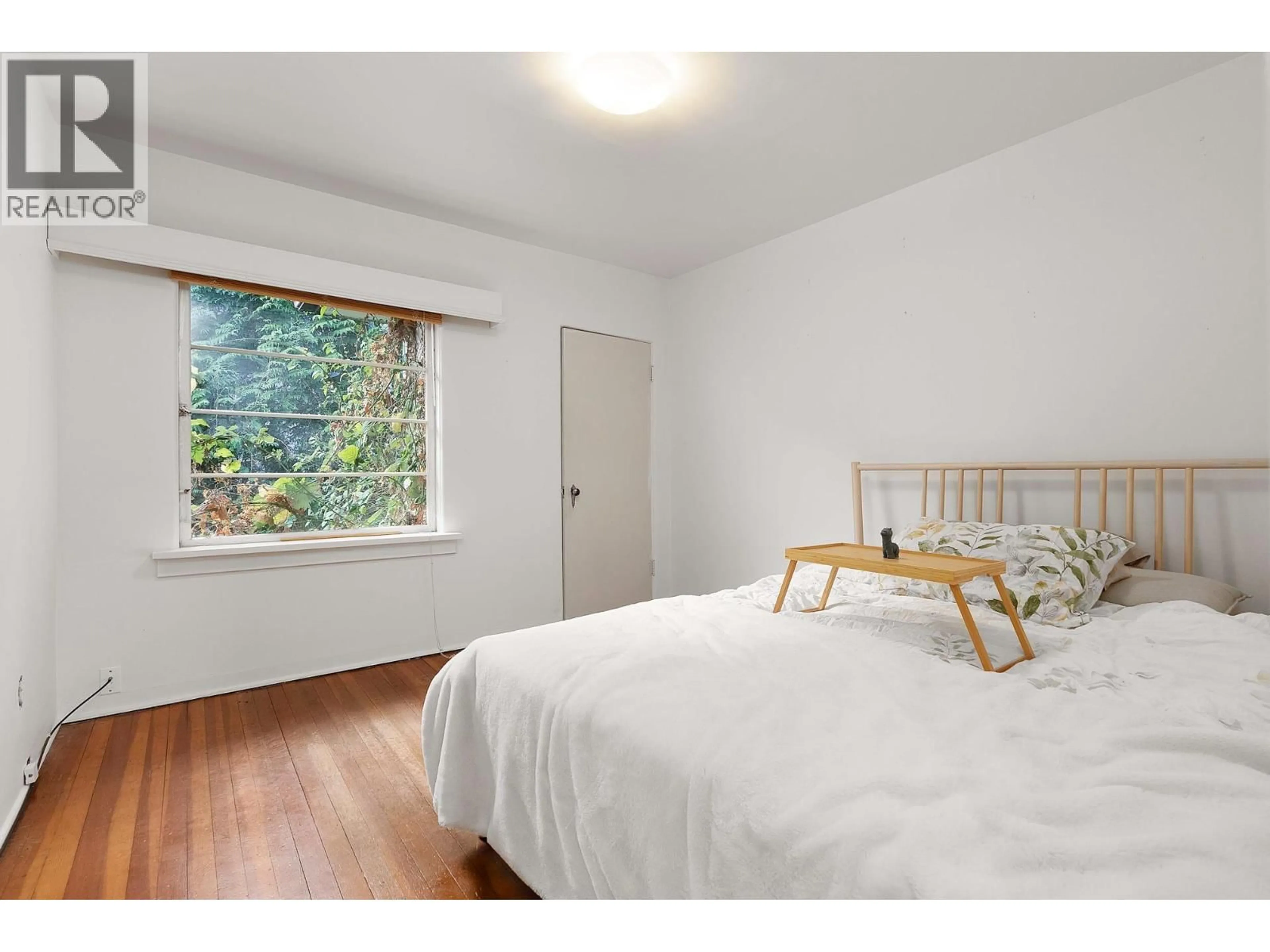 Bedroom with bed, wood/laminate floor for 3548 CREERY AVENUE, West Vancouver British Columbia V7V2M1