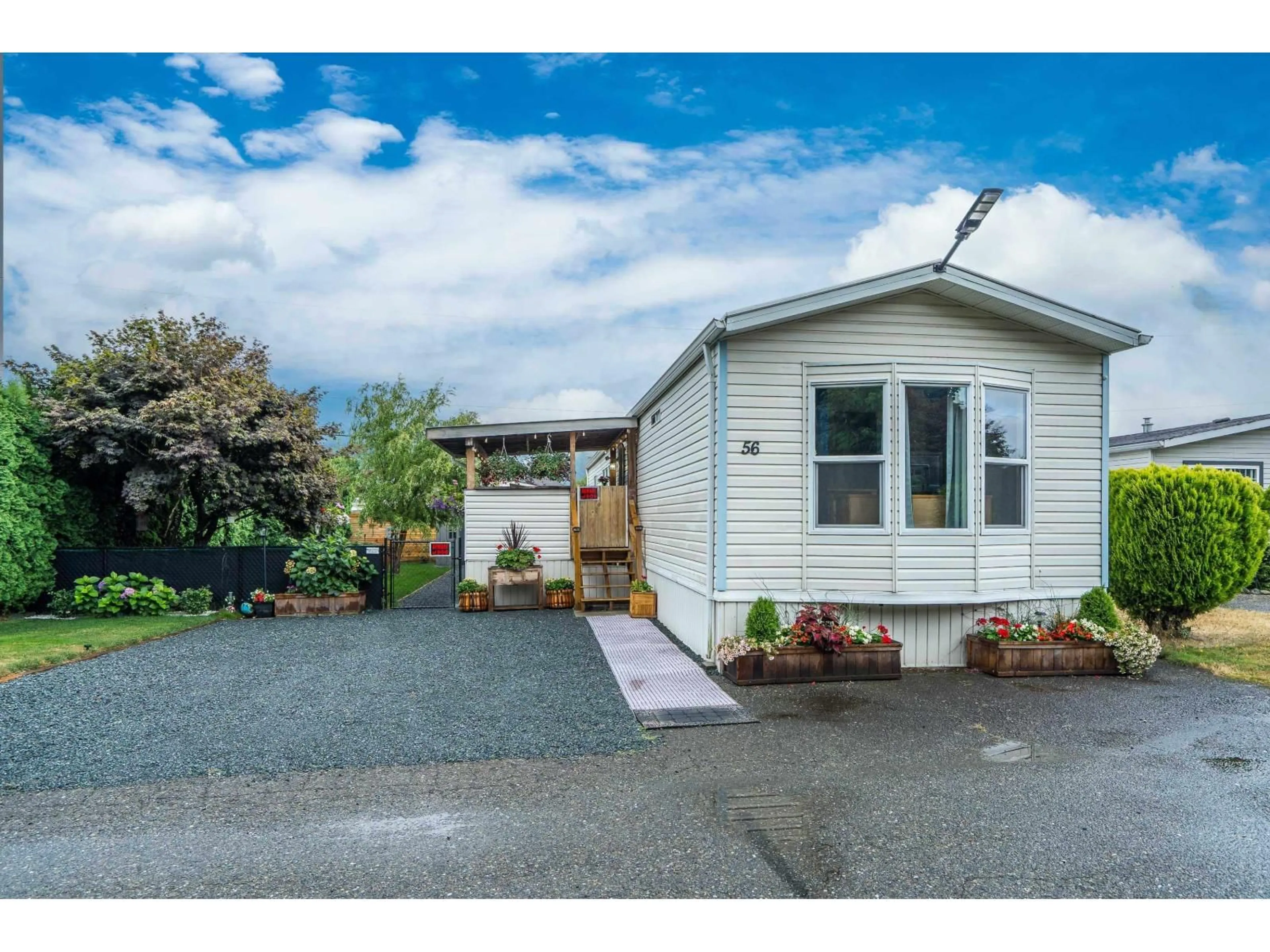 Home with vinyl exterior material, street for 56 - 5742 UNSWORTH ROAD, Chilliwack British Columbia V2R3A2