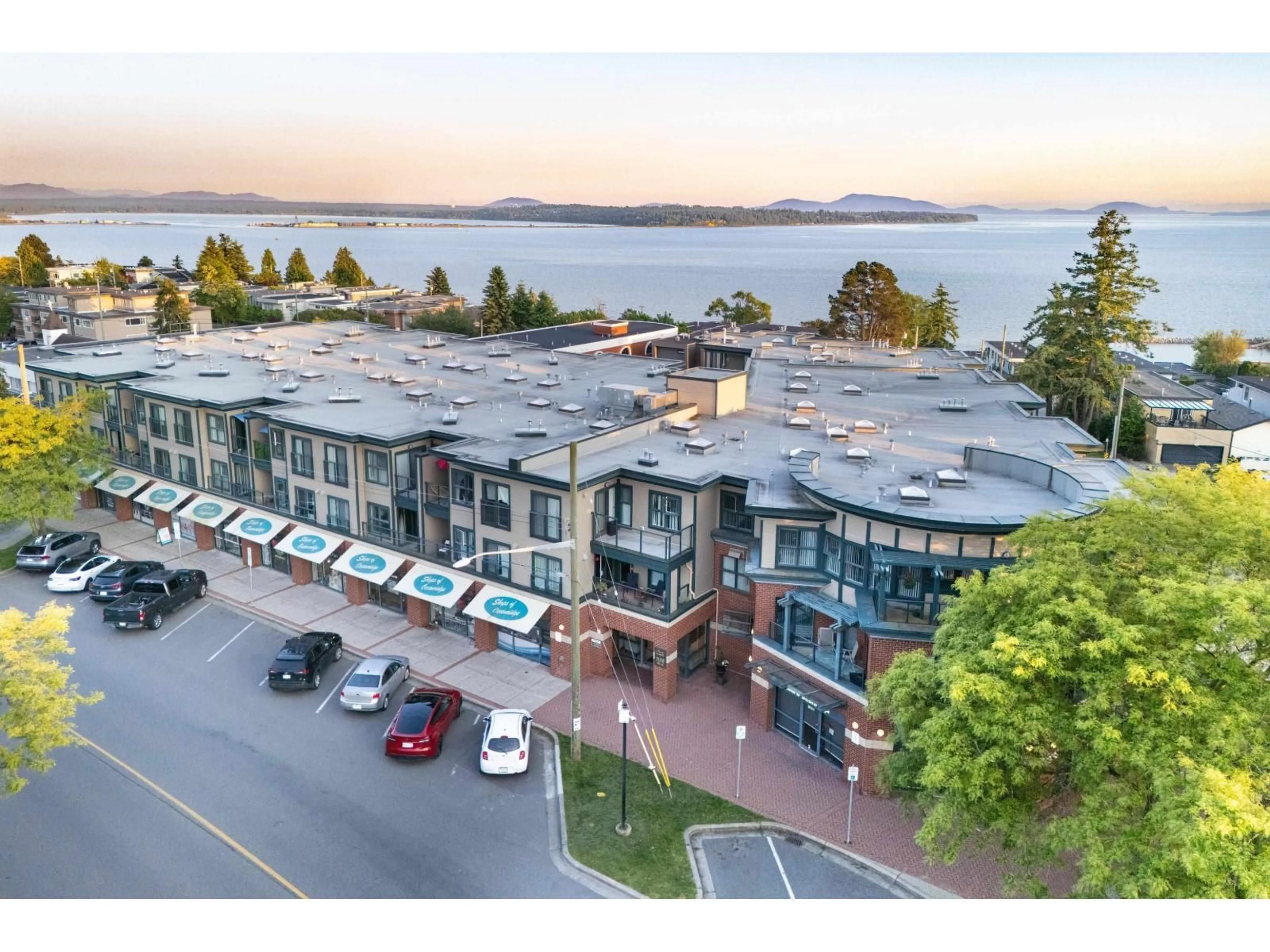 A pic from outside/outdoor area/front of a property/back of a property/a pic from drone, water/lake/river/ocean view for 303 - 15210 PACIFIC, White Rock British Columbia V4B5L2