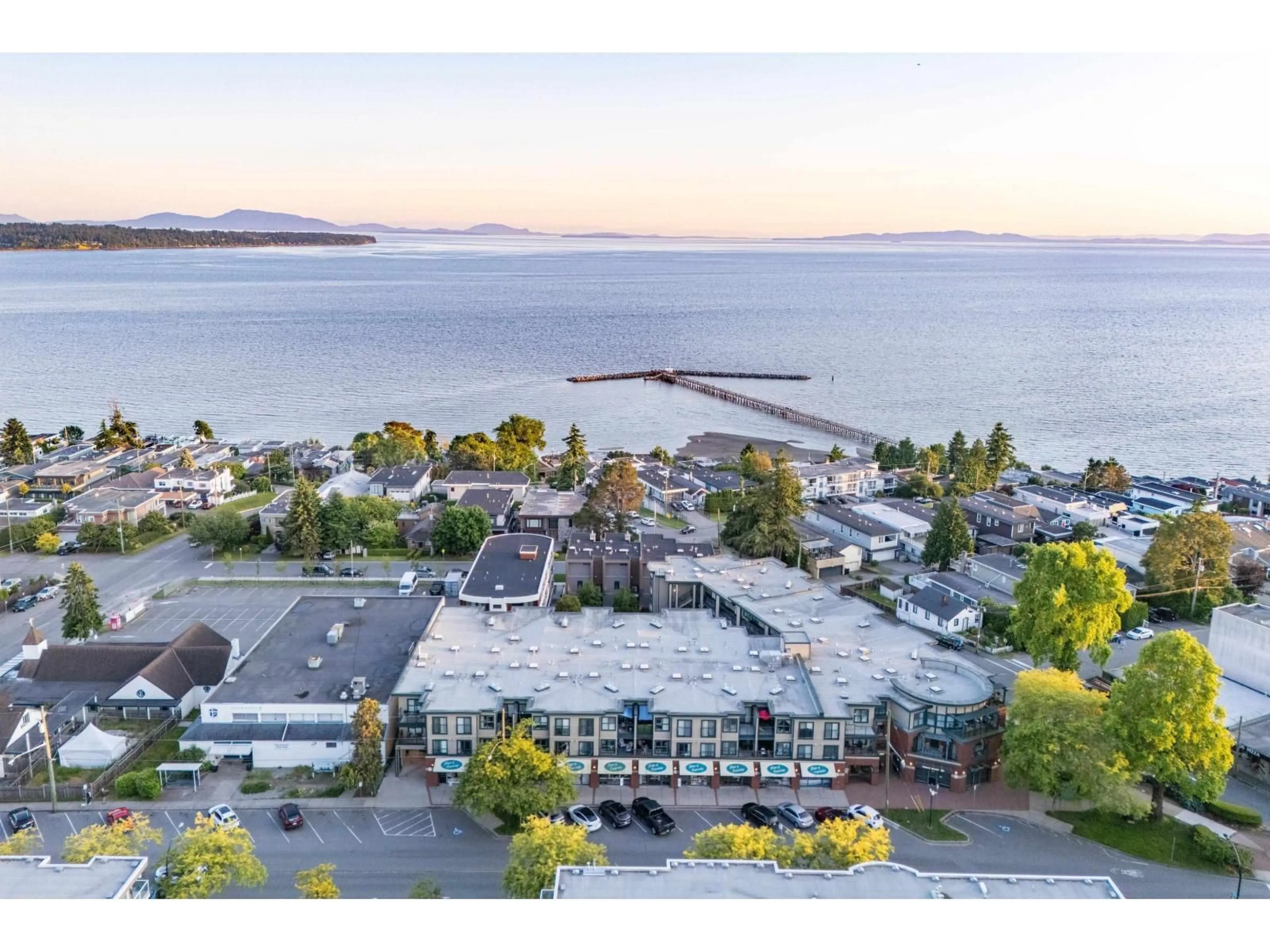 A pic from outside/outdoor area/front of a property/back of a property/a pic from drone, water/lake/river/ocean view for 303 - 15210 PACIFIC, White Rock British Columbia V4B5L2
