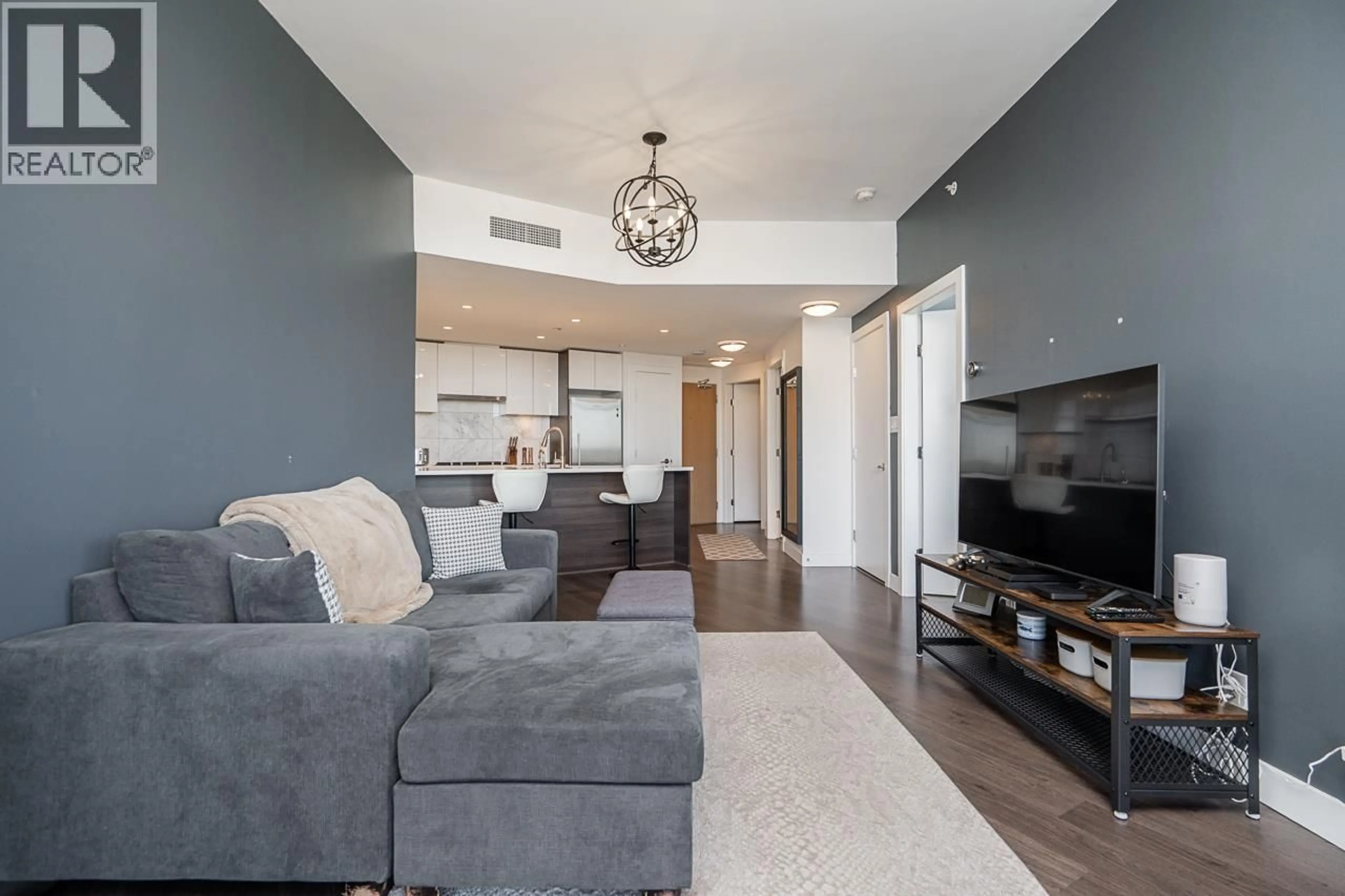 Living room with furniture, unknown for 1011 - 3557 SAWMILL CRESCENT, Vancouver British Columbia V5S0E2