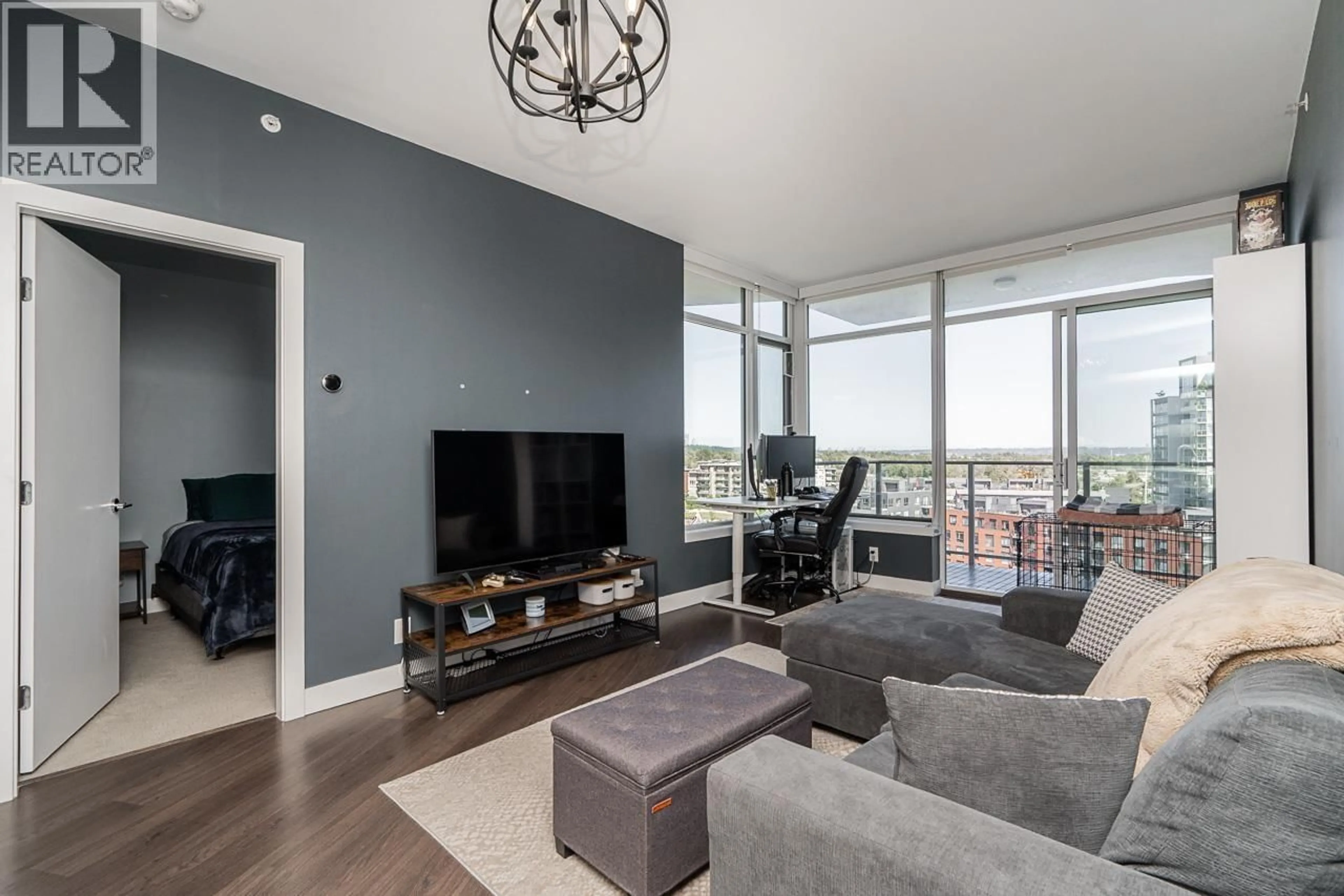 Living room with furniture, unknown for 1011 - 3557 SAWMILL CRESCENT, Vancouver British Columbia V5S0E2