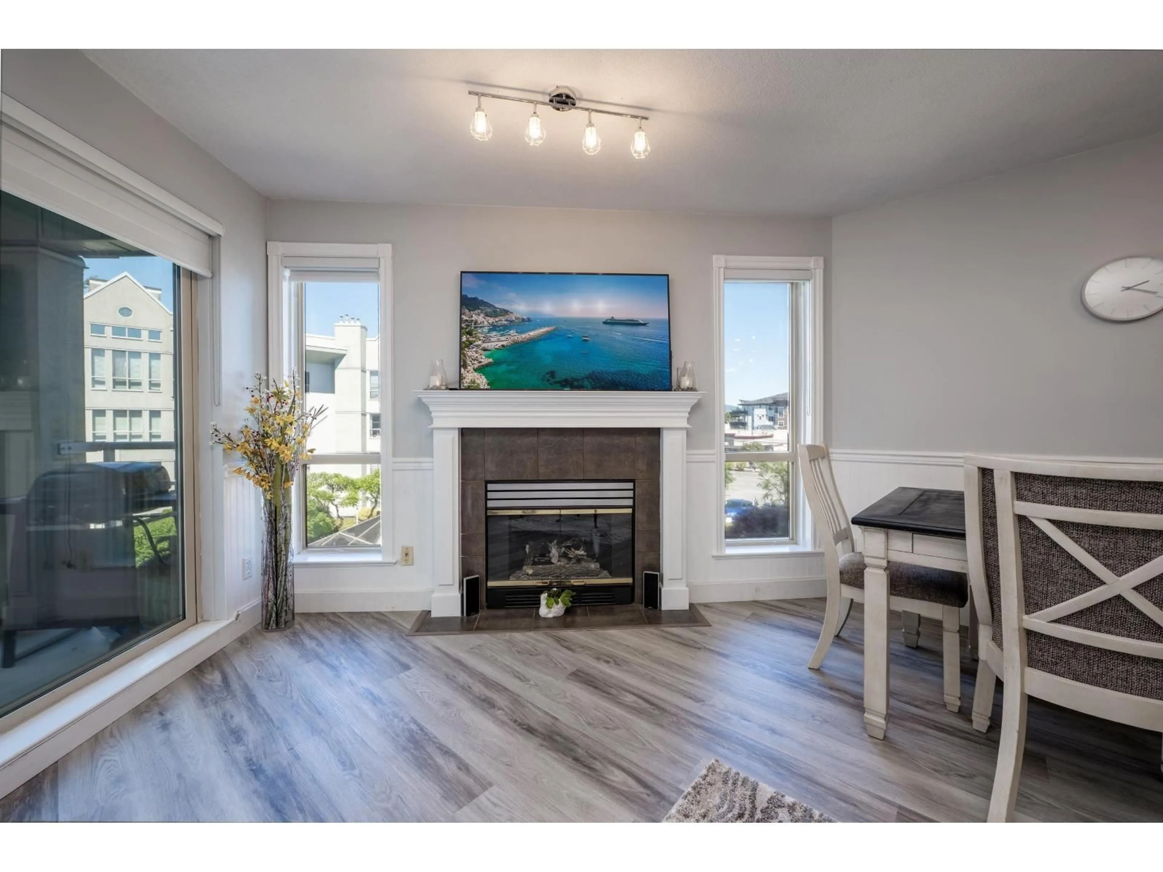Living room with furniture, wood/laminate floor for 303 - 2575 WARE, Abbotsford British Columbia V2S3E2