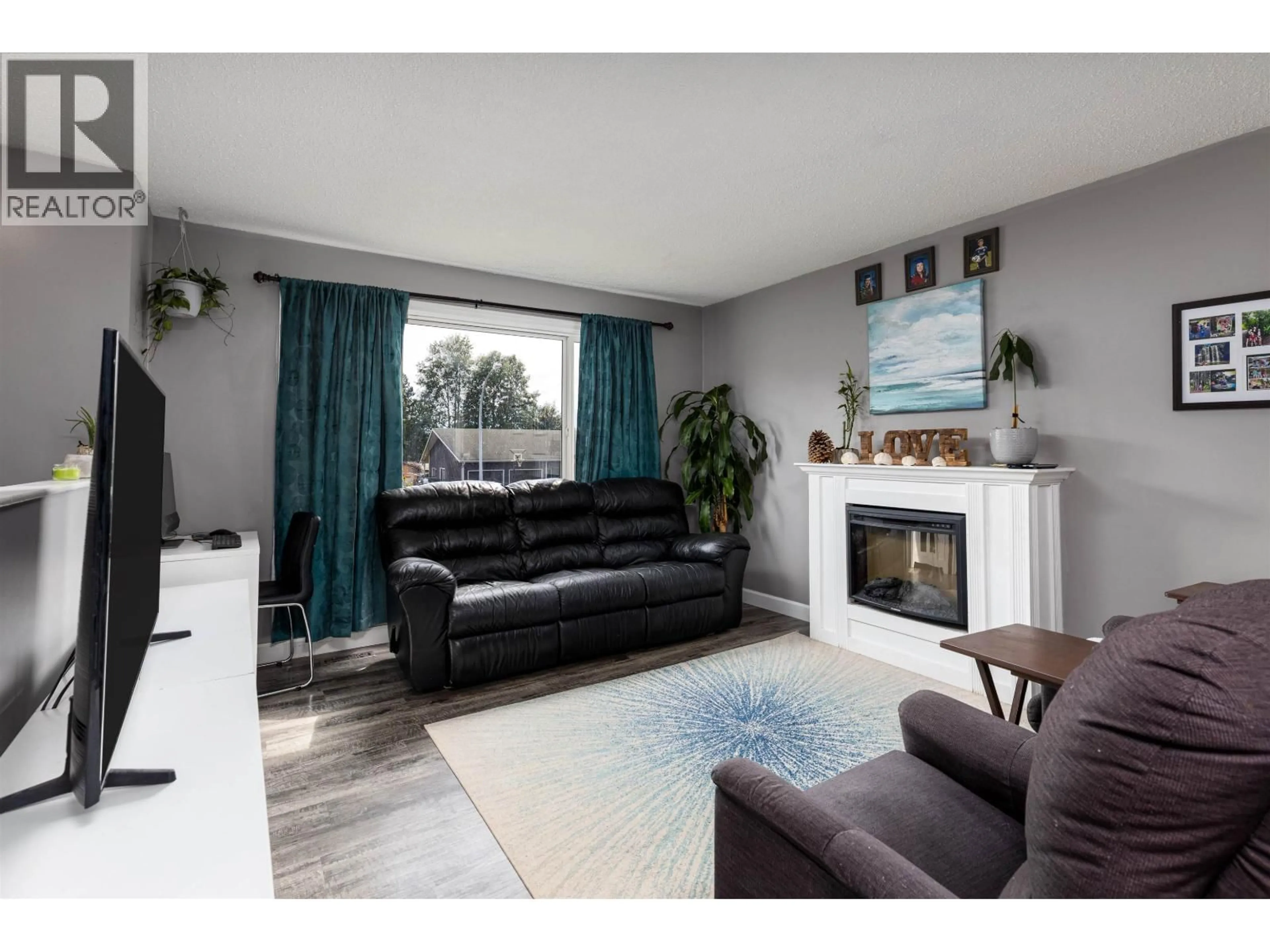 Living room with furniture, wood/laminate floor for 4912 LABELLE AVENUE, Terrace British Columbia V8G4M8