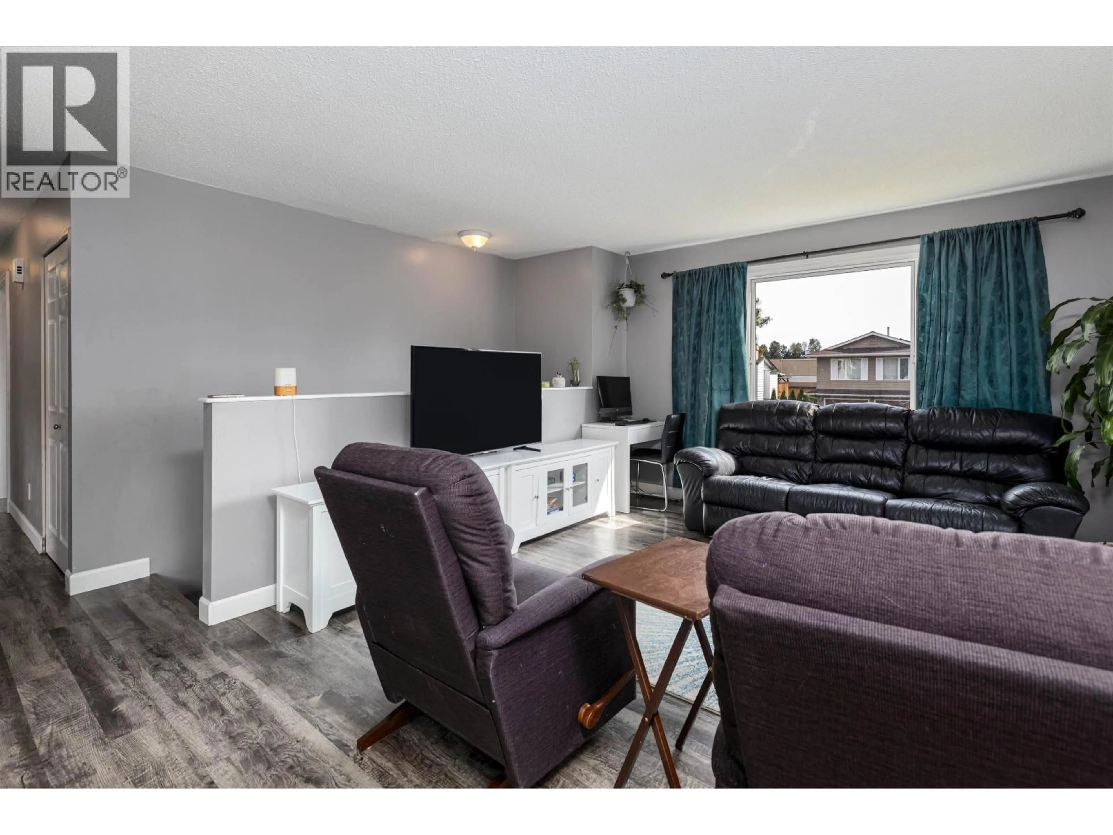 Living room with furniture, wood/laminate floor for 4912 LABELLE AVENUE, Terrace British Columbia V8G4M8