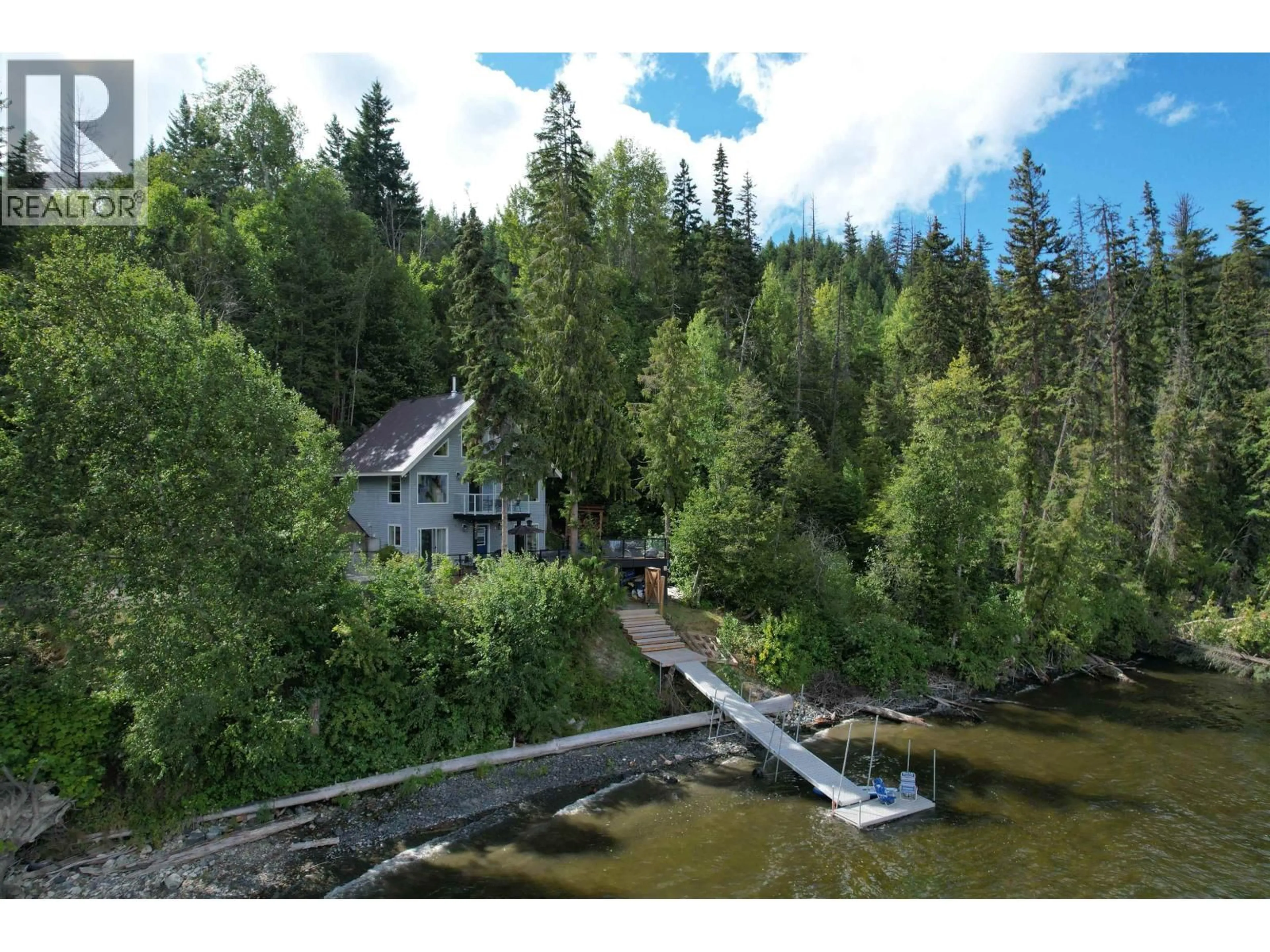 A pic from outside/outdoor area/front of a property/back of a property/a pic from drone, water/lake/river/ocean view for 3937 CANIM-HENDRIX LAKE ROAD, Canim Lake British Columbia V0K1J0