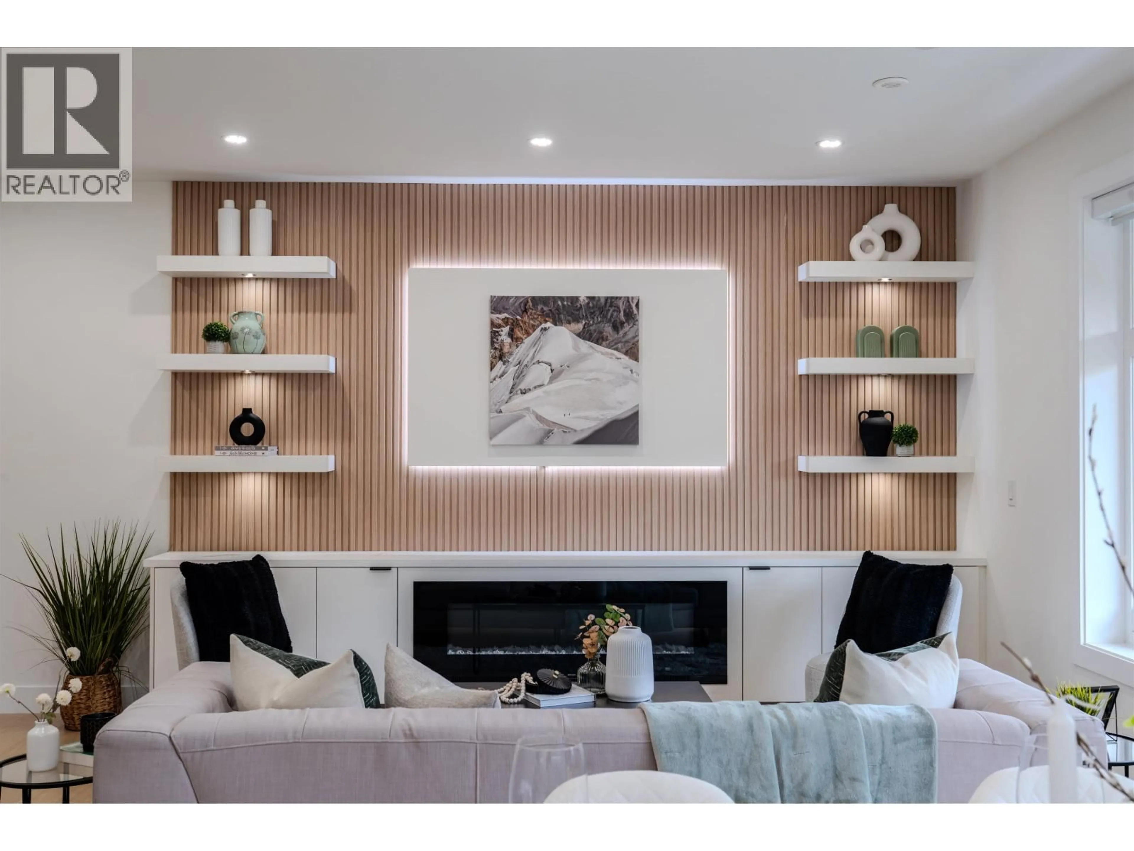Living room with furniture, wood/laminate floor for 2 - 3576 PENDER STREET, Vancouver British Columbia V5K2E3