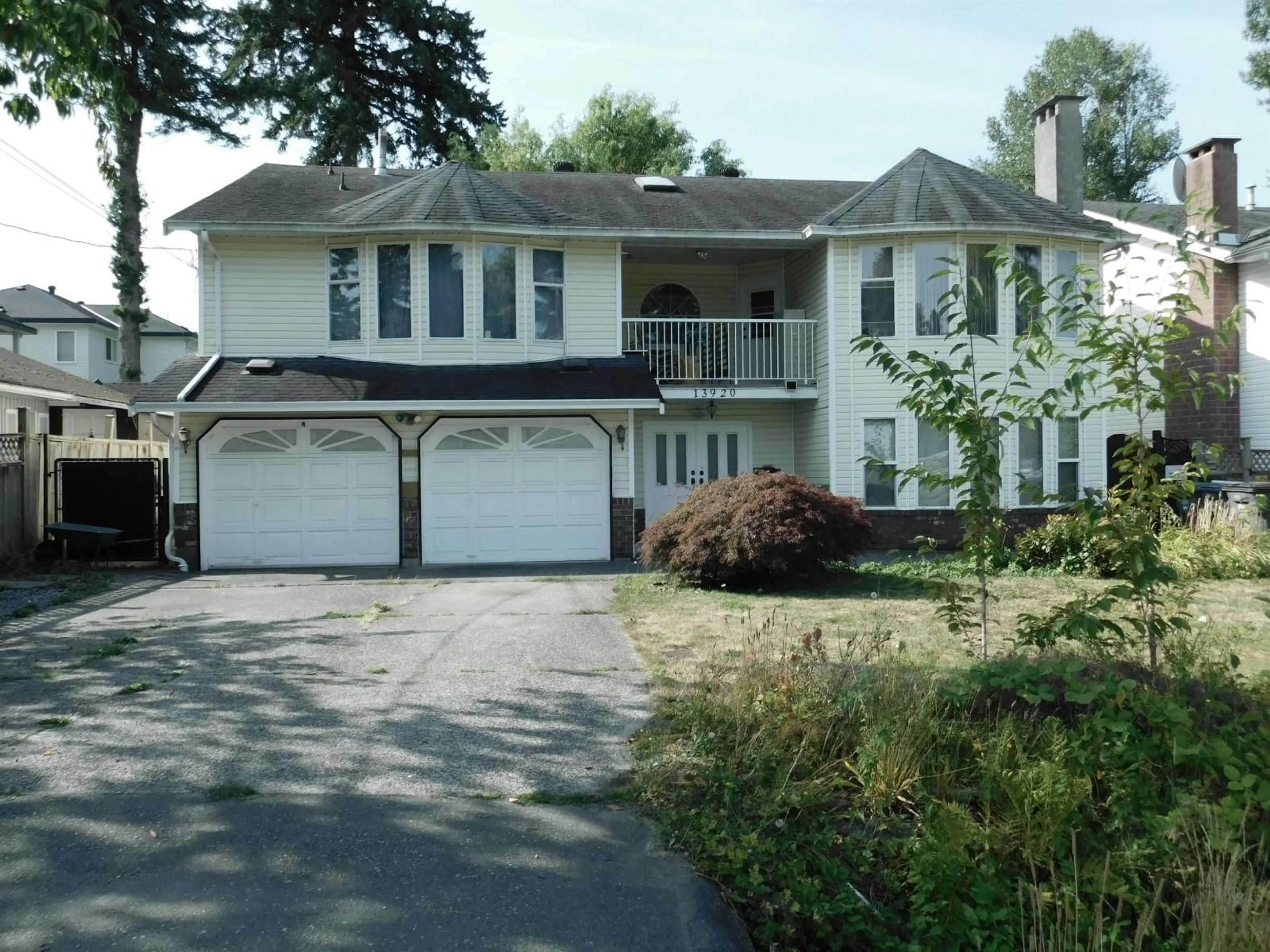 Home with vinyl exterior material, street for 13920 109, Surrey British Columbia V3R1X1