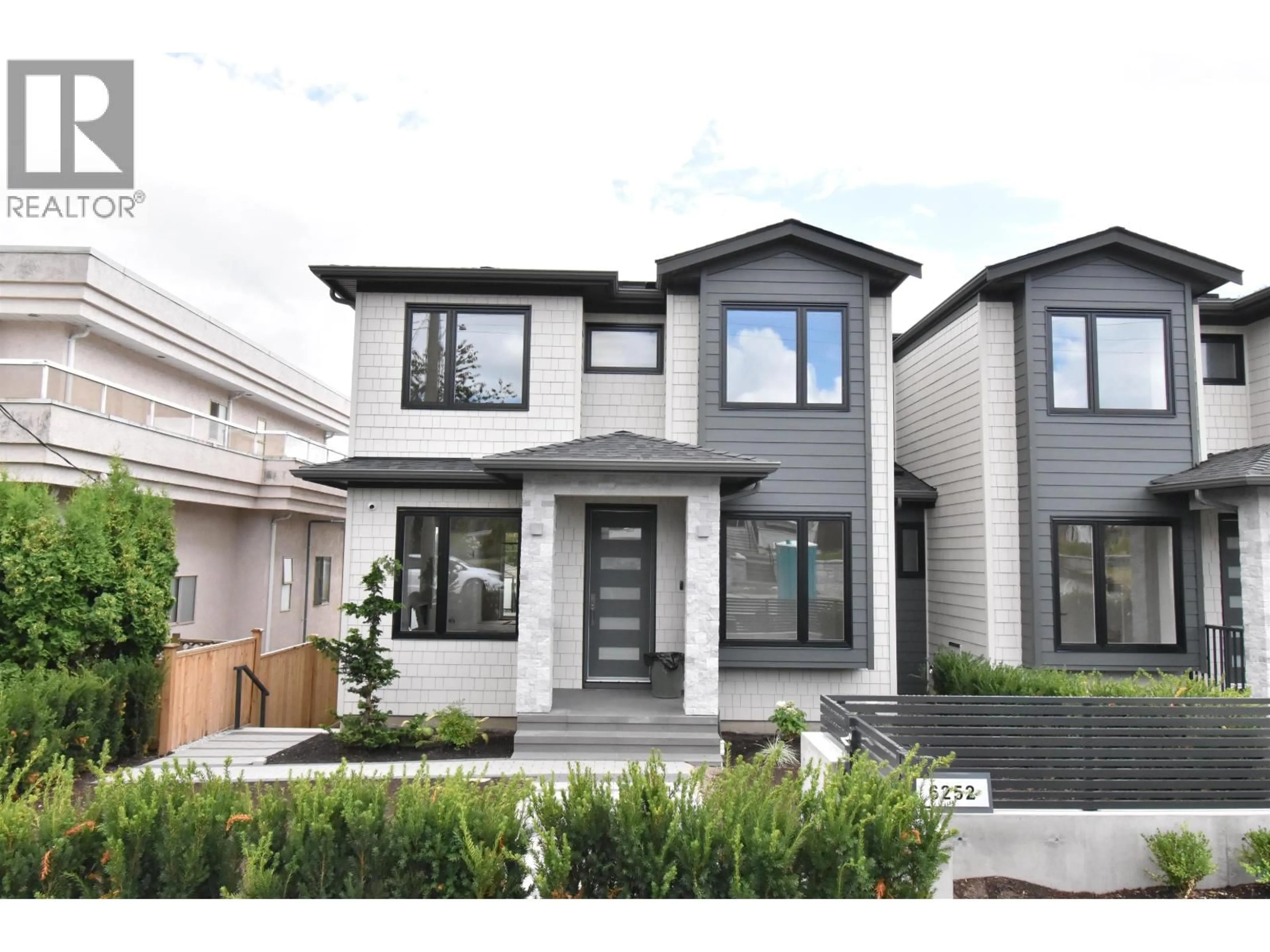 Home with vinyl exterior material, street for 6252 KITCHENER STREET, Burnaby British Columbia V5B2J4