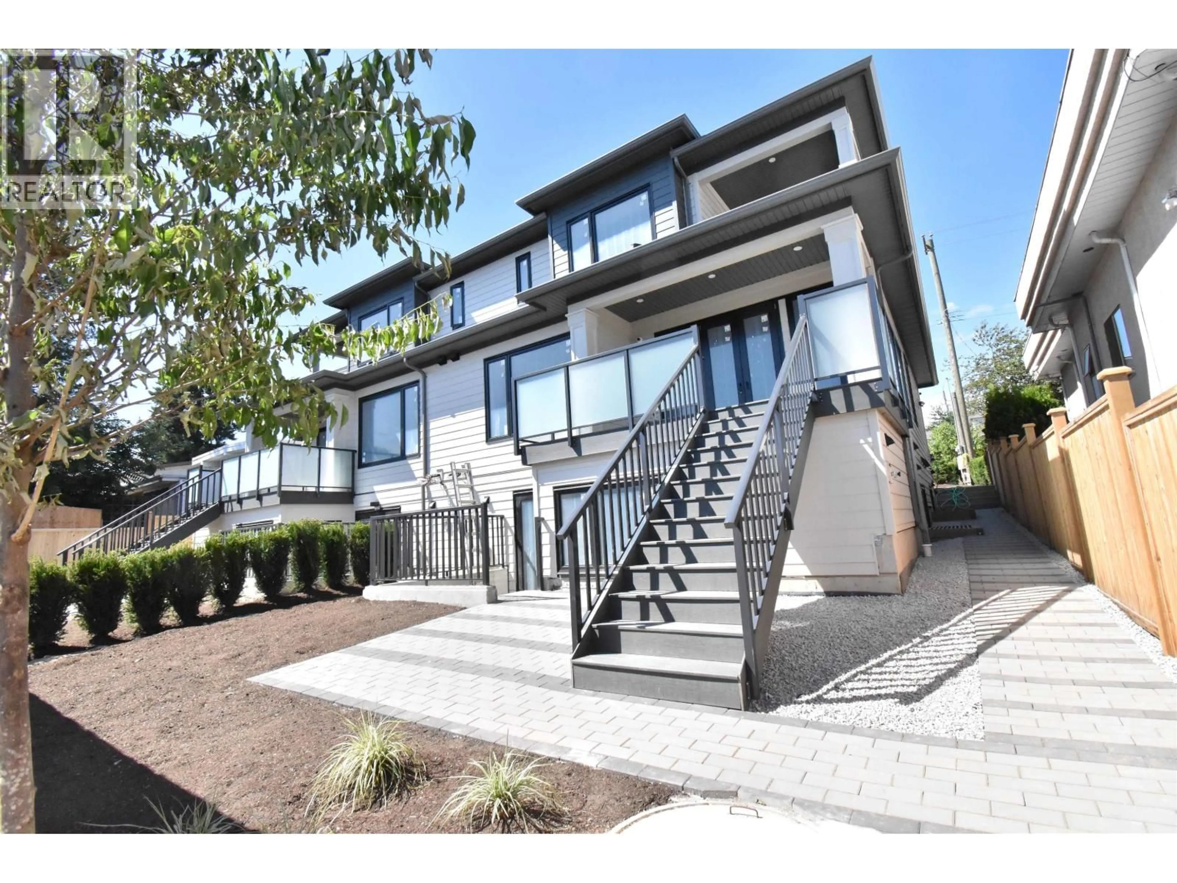 Home with vinyl exterior material, street for 6252 KITCHENER STREET, Burnaby British Columbia V5B2J4